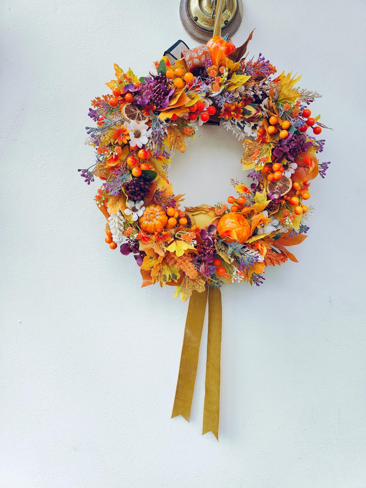 Autumn decoration wreath Autumnal orange brown yellow pumpkins leaves