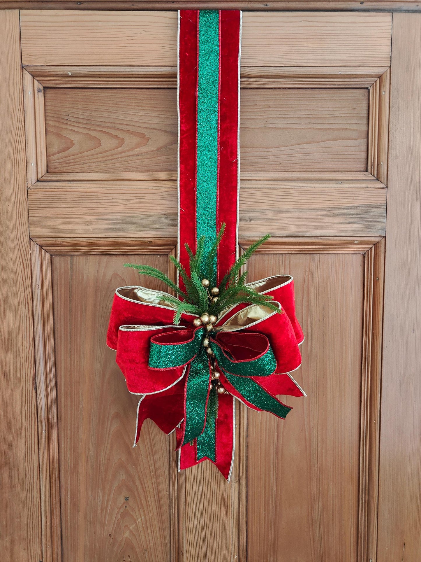 Door hanger traditional Christmas swag over the door large bow