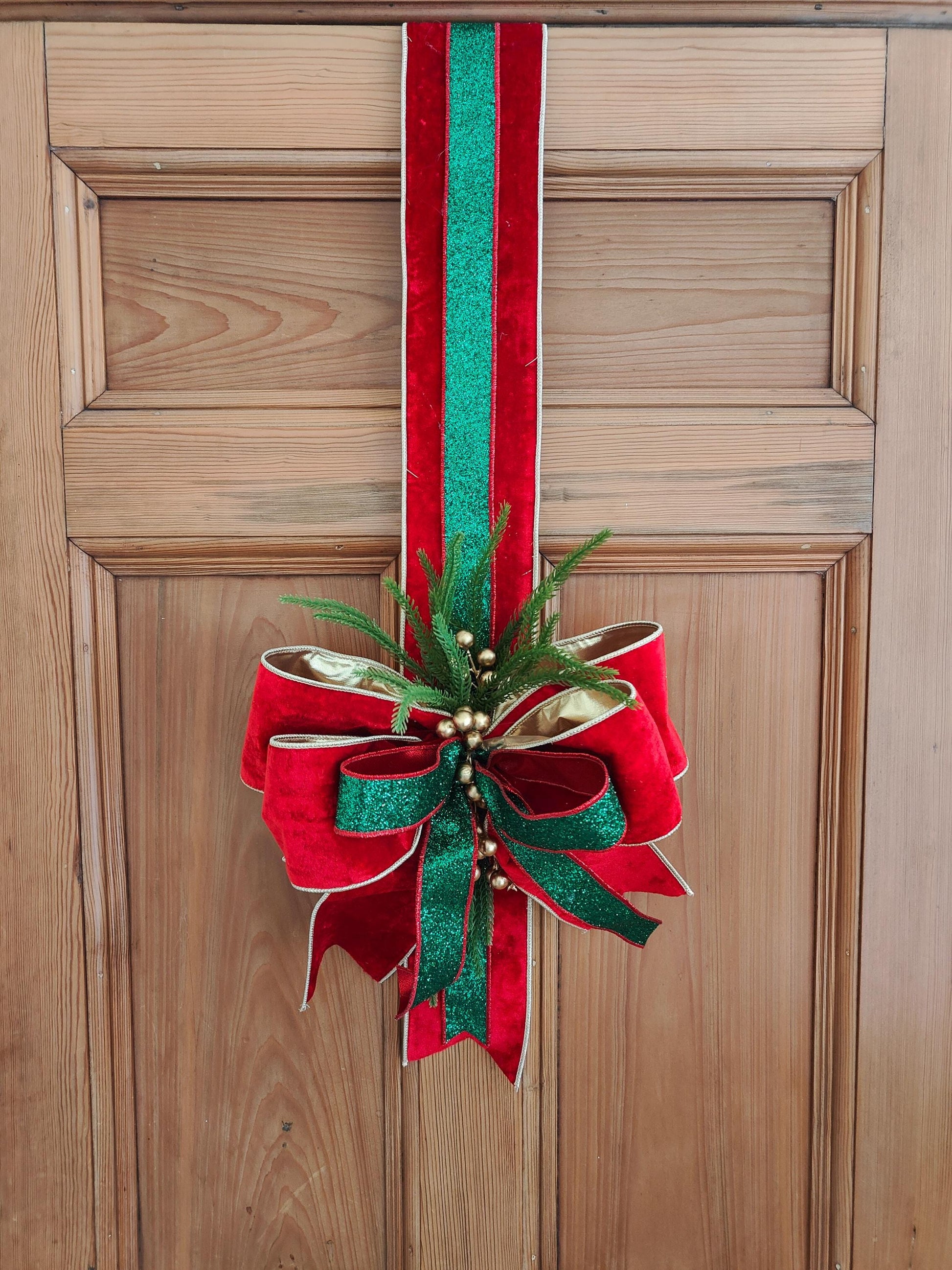Door hanger traditional Christmas swag over the door large bow