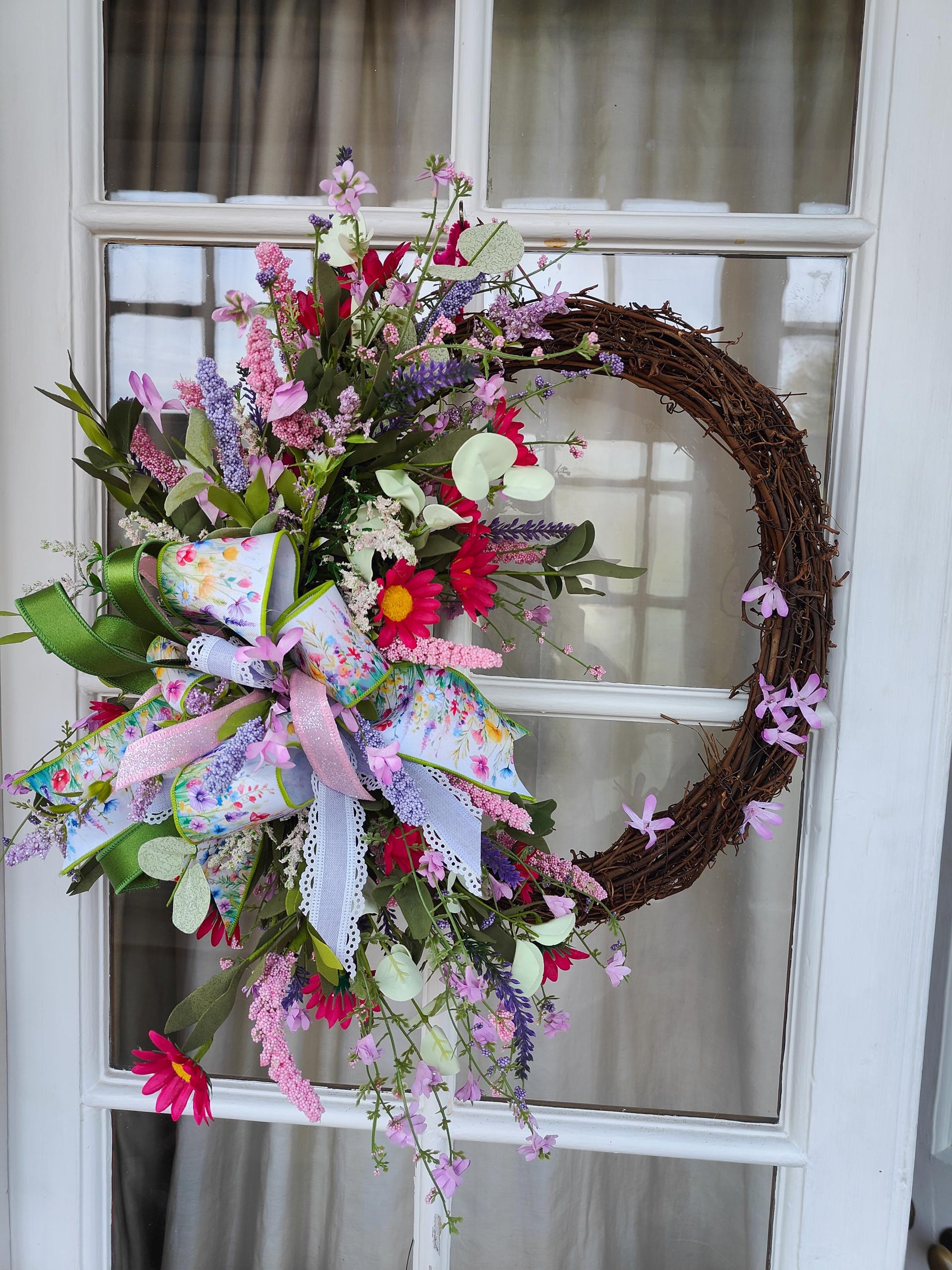 Wreath Spring Summer multi coloured wild flowers Farrisilk ribbons pinks lavenders greens