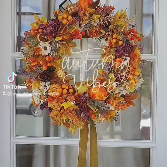 Autumn decoration wreath Autumnal orange brown yellow pumpkins leaves