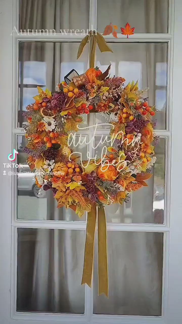 Autumn decoration wreath Autumnal orange brown yellow pumpkins leaves