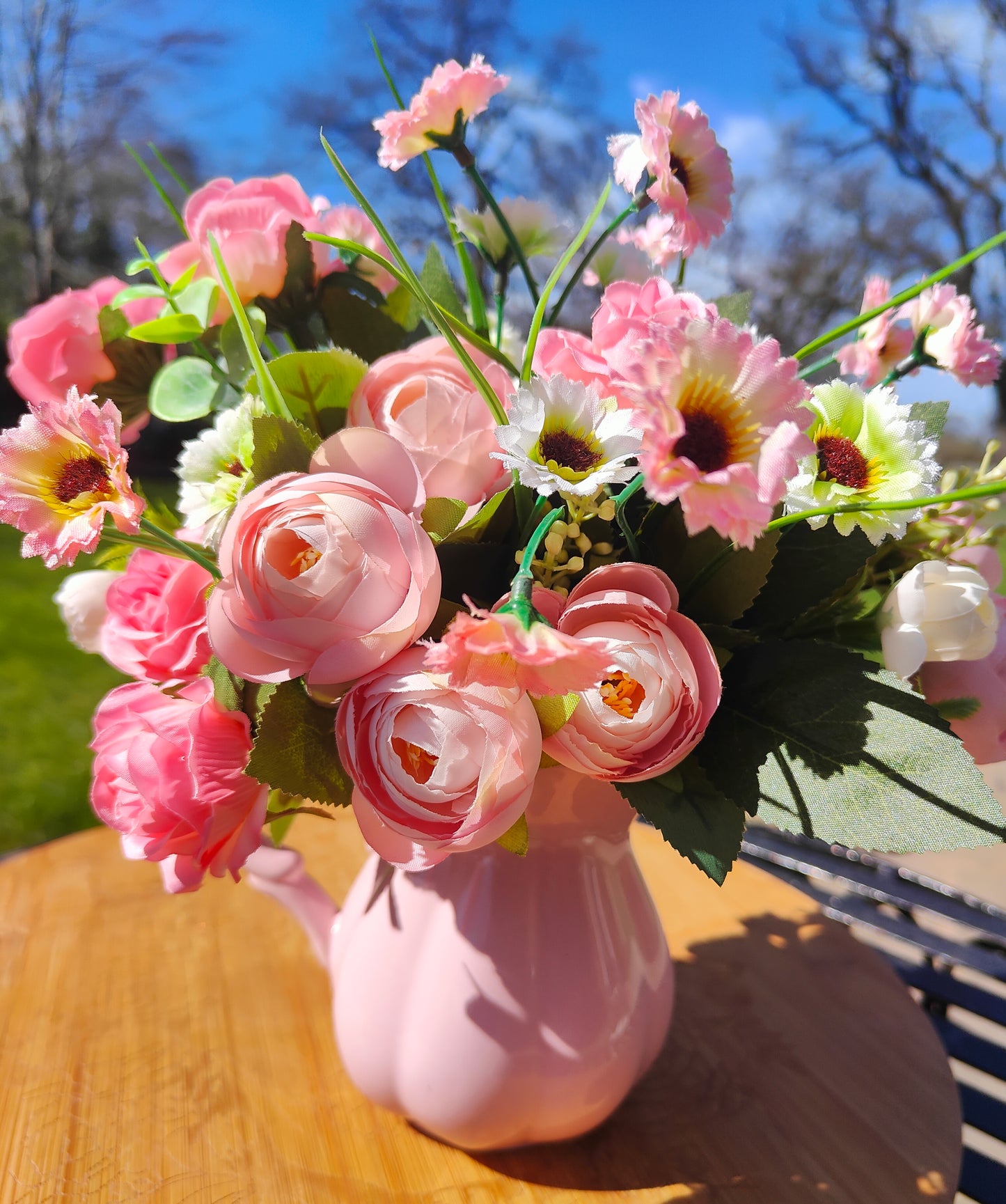 Flower arrangement artificial pink roses ranunculus in ceramic pink jug by Price & Kensington vintage