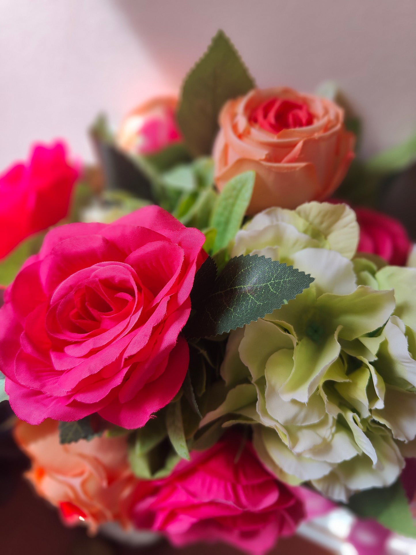 Wedding bride bouquet hand-tied artificial flowers dark pink cerise, orange, pale light green