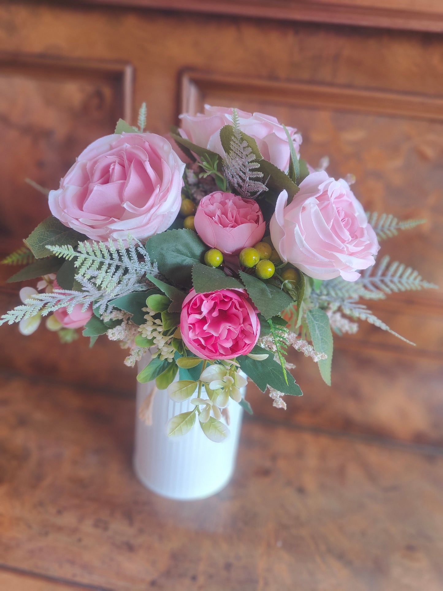 Pink flower arrangement milk churn centrepiece wedding flowers gift
