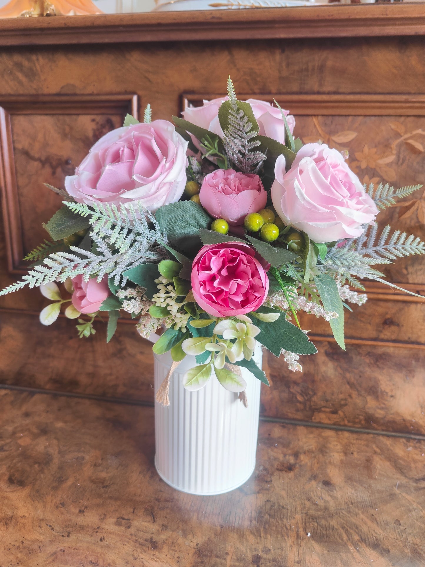 Pink flower arrangement milk churn centrepiece wedding flowers gift