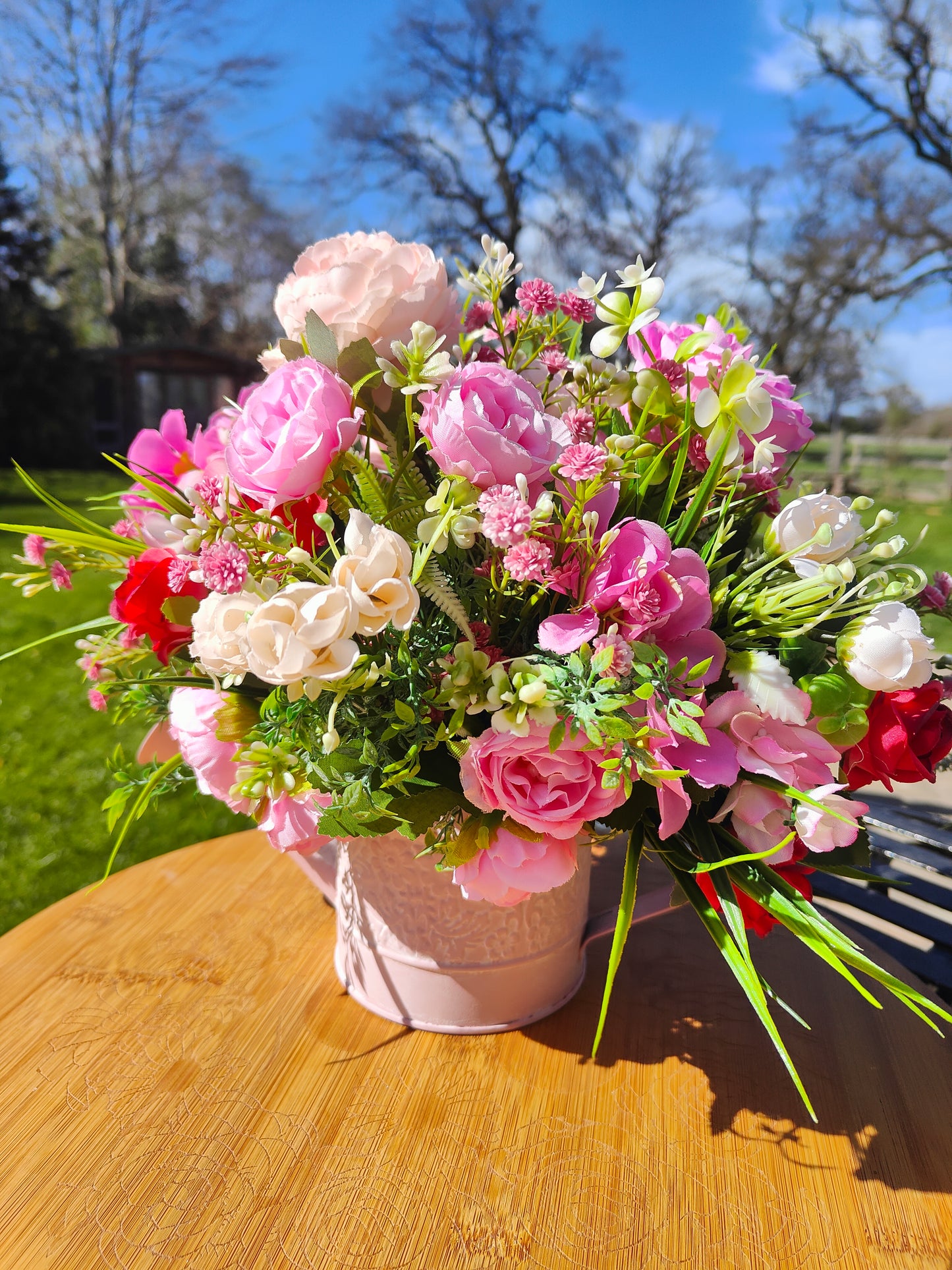 Flower arrangement watering can planter lilac lavender pinks