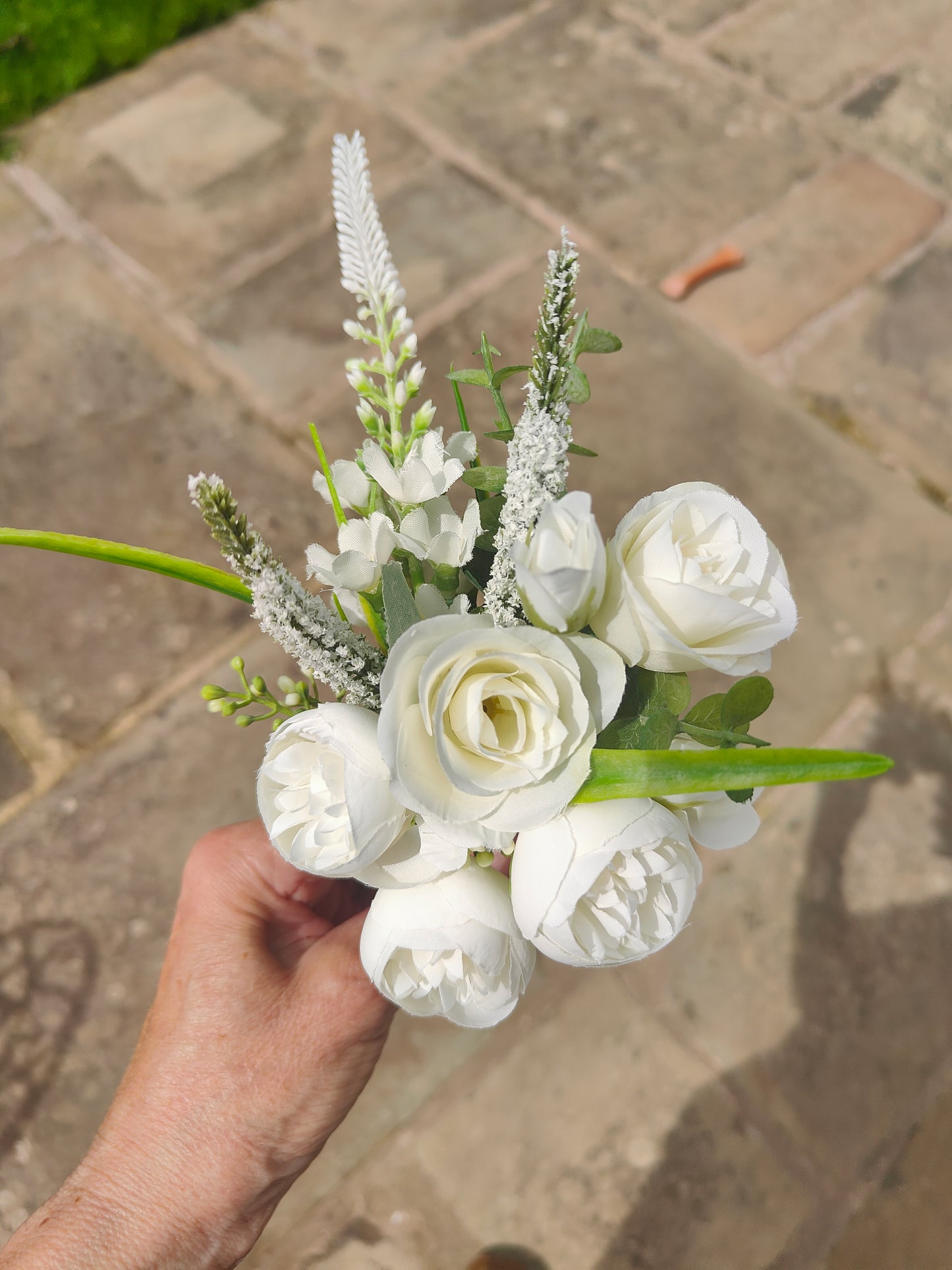 Bride bouquet white roses, peonies, ranunculus and matching groom button hole