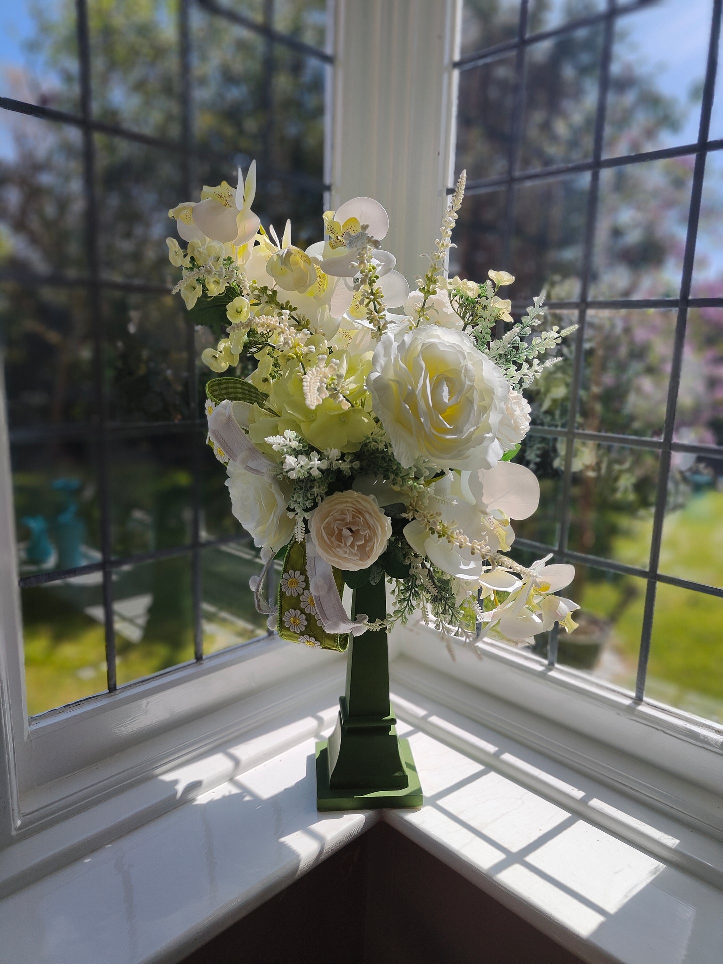 White flower arrangement candlestick tall centrepiece peonies hydrangea orchids ivory artificial flowers