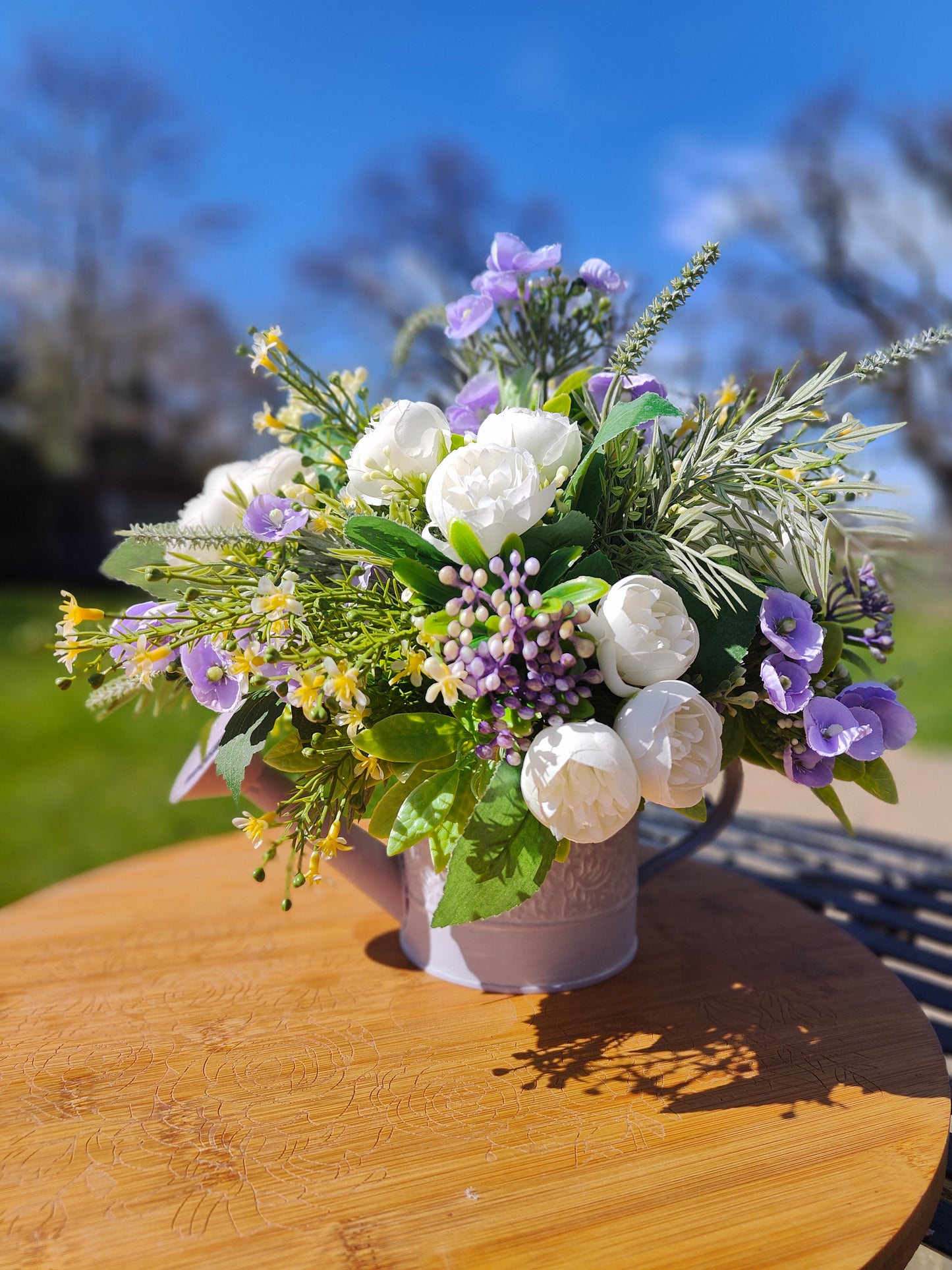 Flower arrangement watering can planter lilac lavender pinks