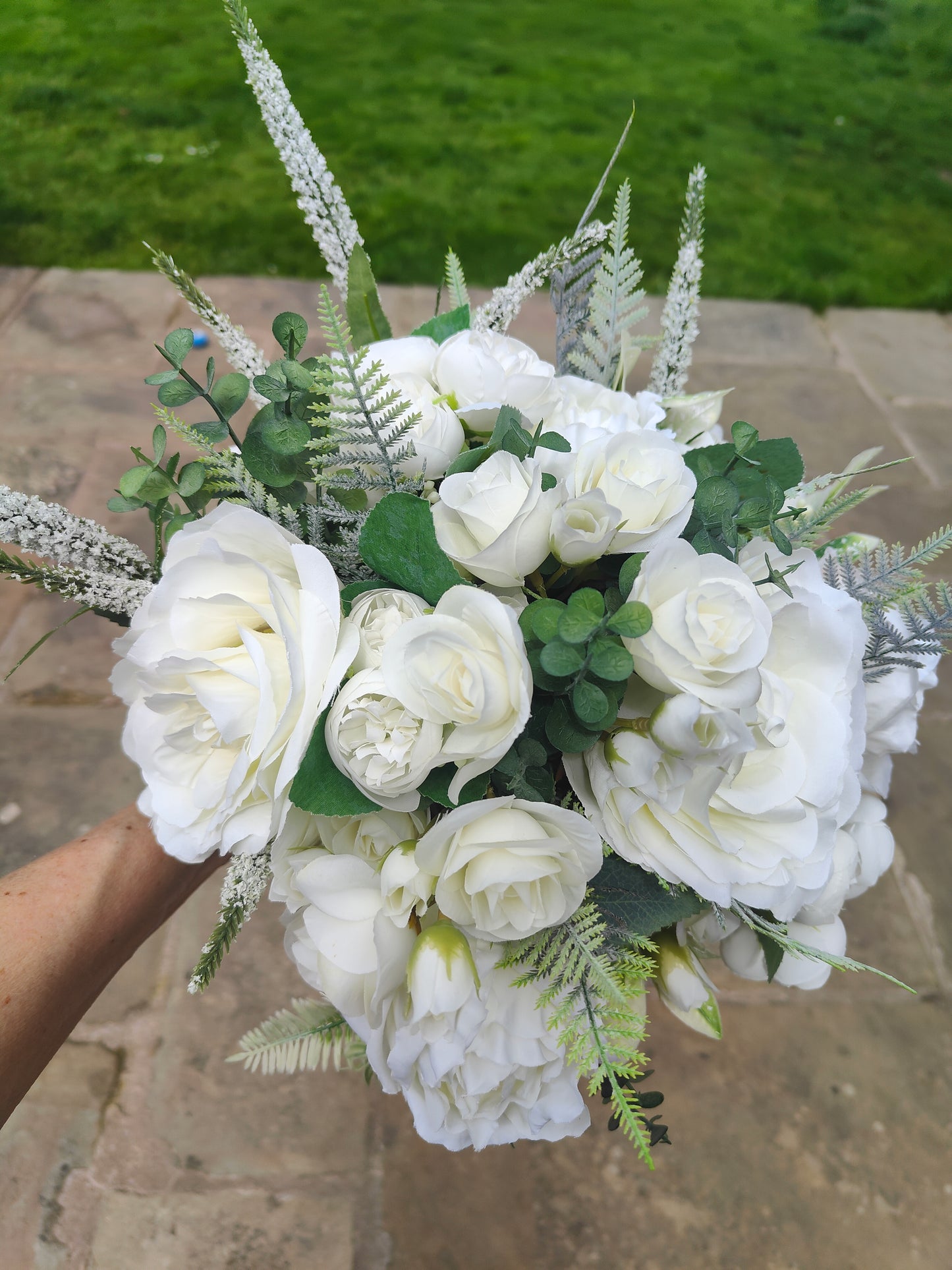 Bride bouquet white roses, peonies, ranunculus and matching groom button hole