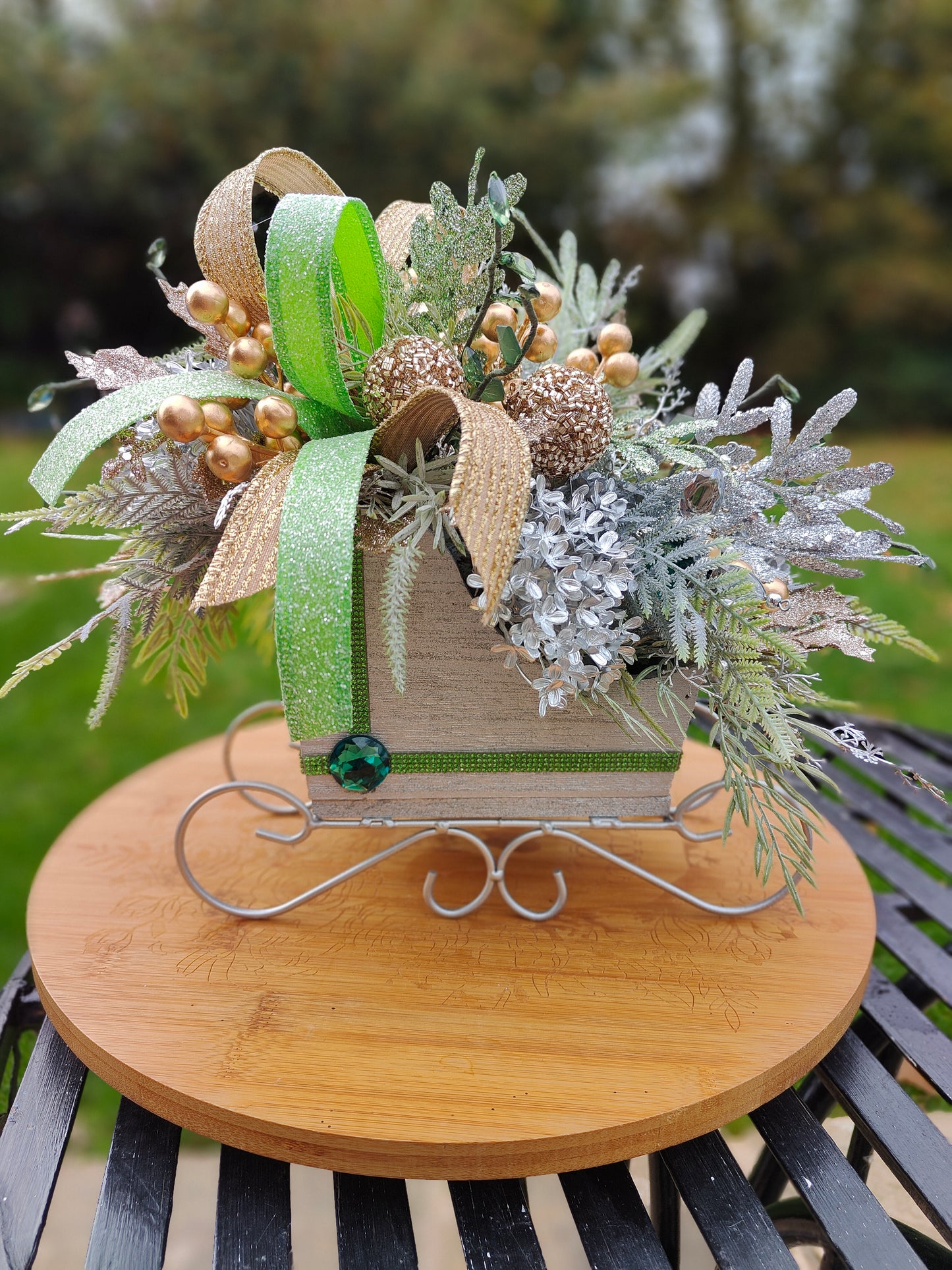 Christmas decoration sleigh gold silver tablecentre arrangement