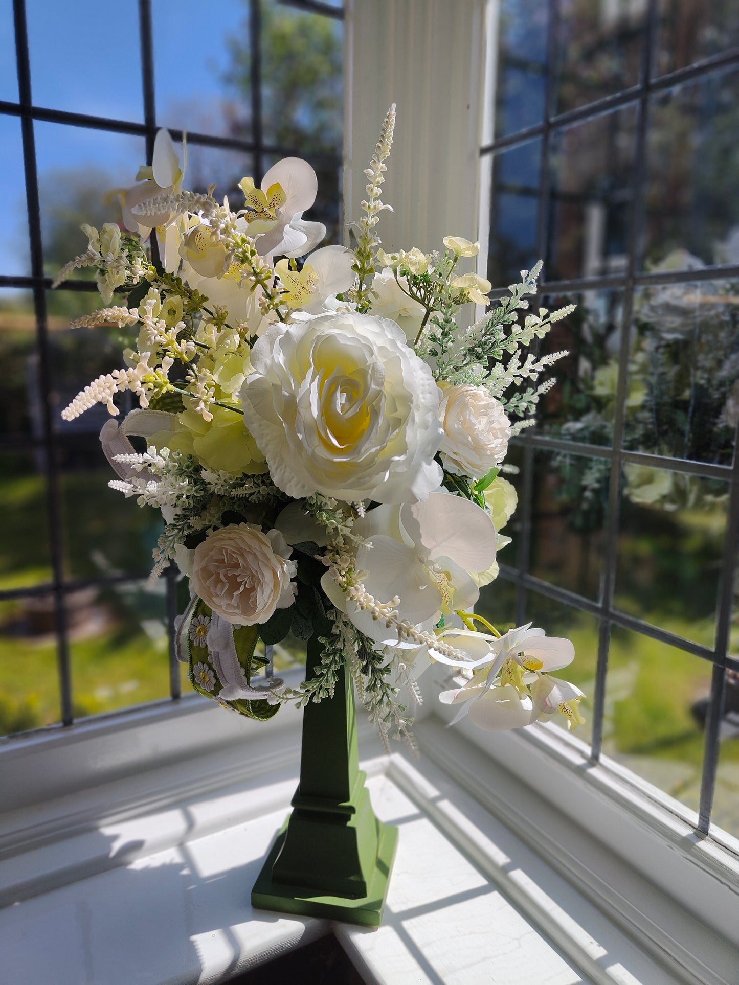 White flower arrangement candlestick tall centrepiece peonies hydrangea orchids ivory artificial flowers