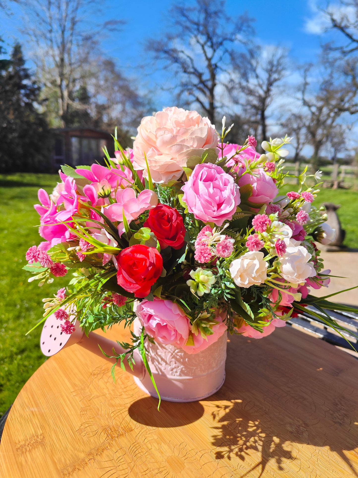 Flower arrangement watering can planter lilac lavender pinks