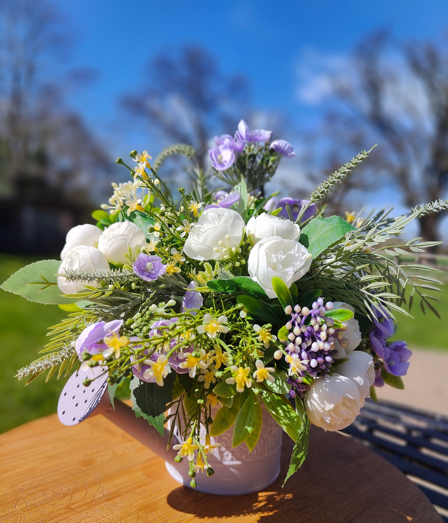 Flower arrangement watering can planter lilac lavender pinks