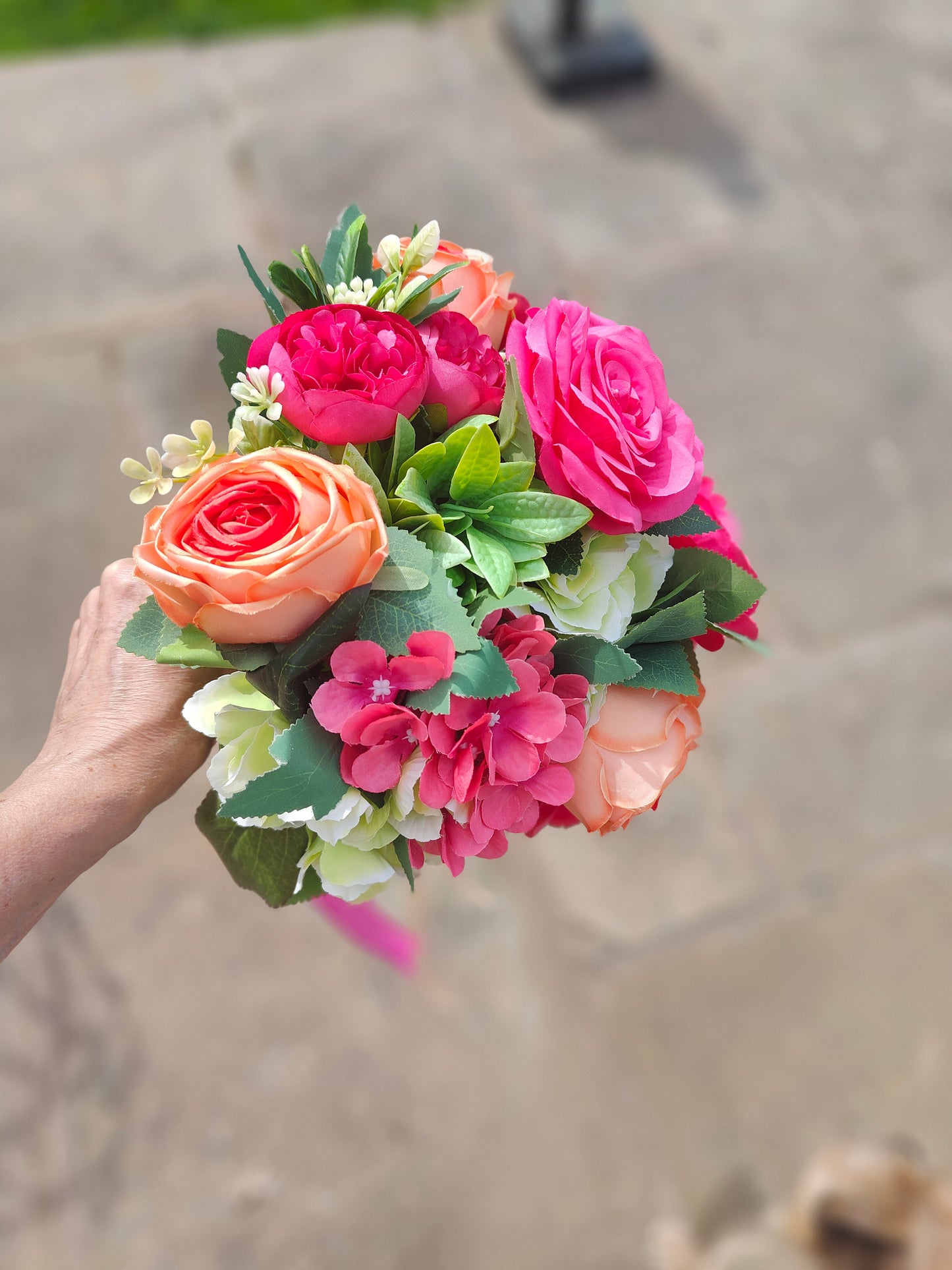 Wedding bride bouquet hand-tied artificial flowers dark pink cerise, orange, pale light green