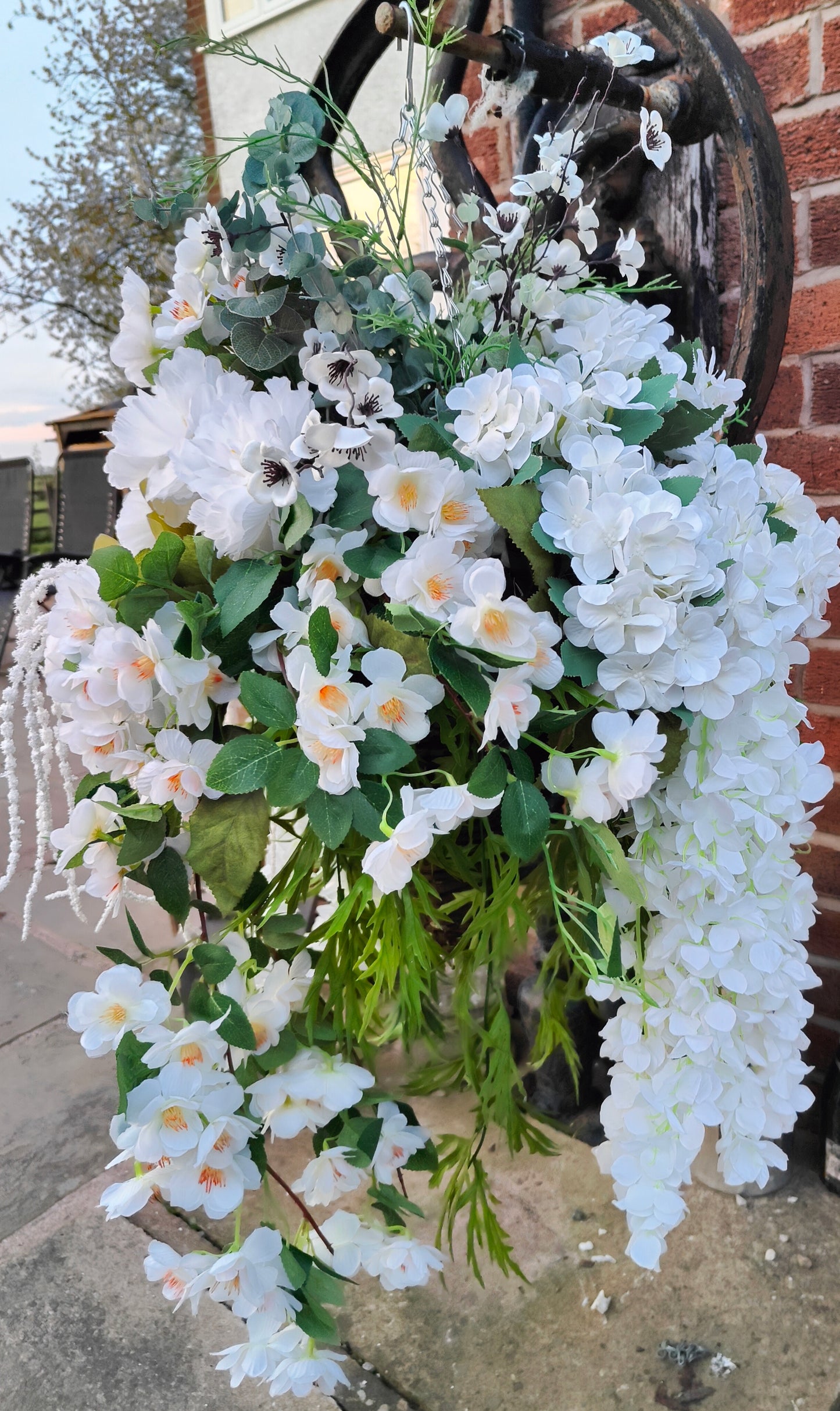 Hanging basket very large white artificial flowers cone