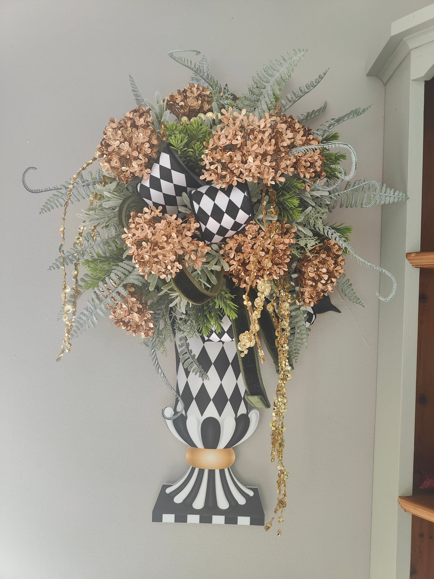 Vase wreath wall decor Mackenzie Childs style vibes Christmas swag