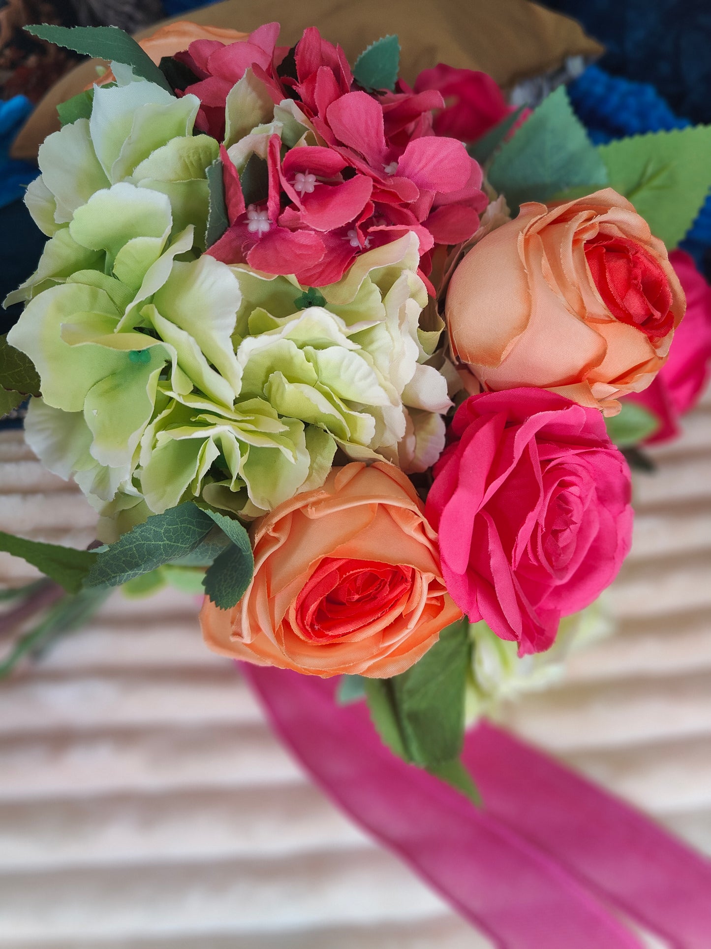Wedding bride bouquet hand-tied artificial flowers dark pink cerise, orange, pale light green