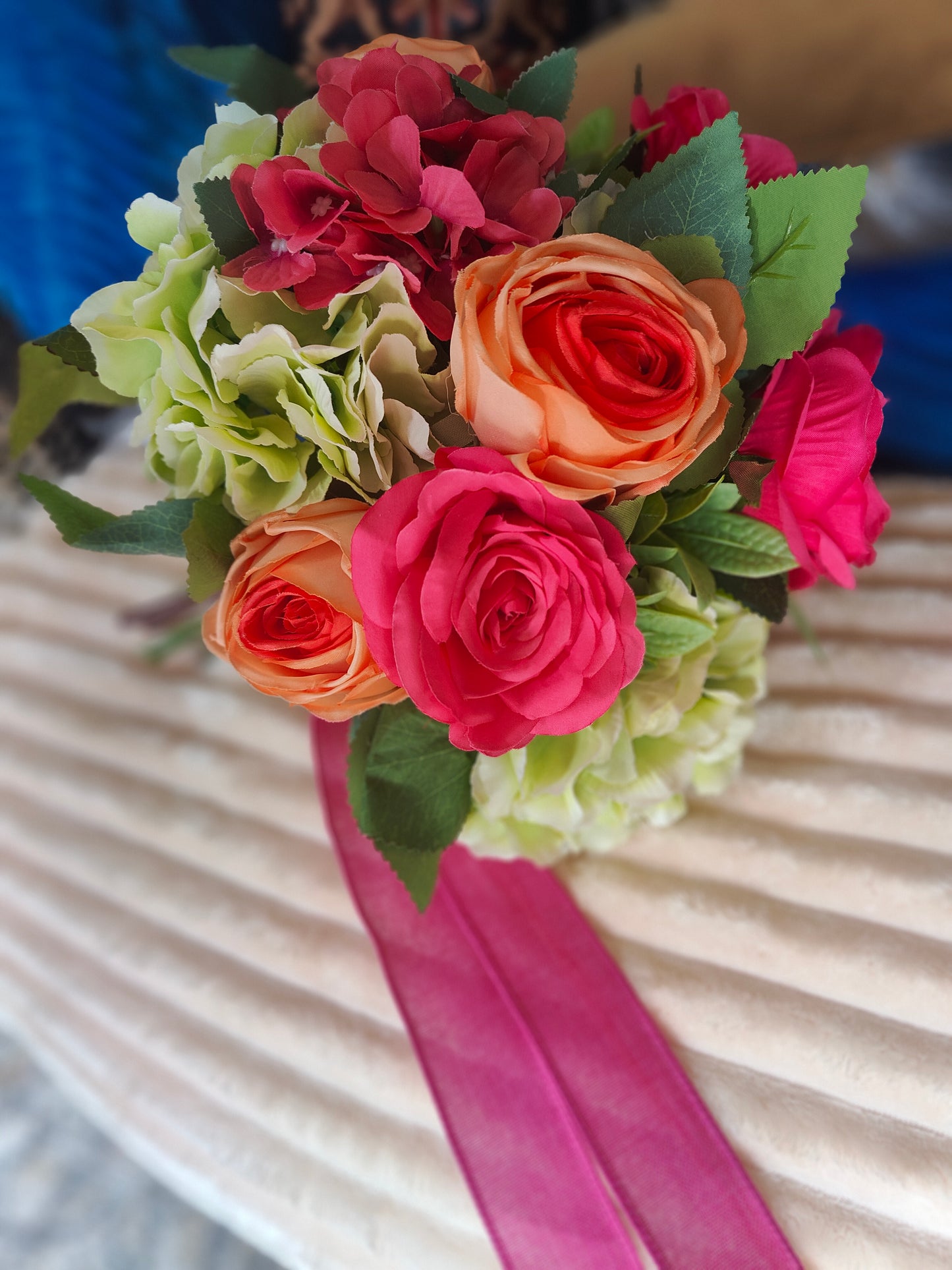 Wedding bride bouquet hand-tied artificial flowers dark pink cerise, orange, pale light green