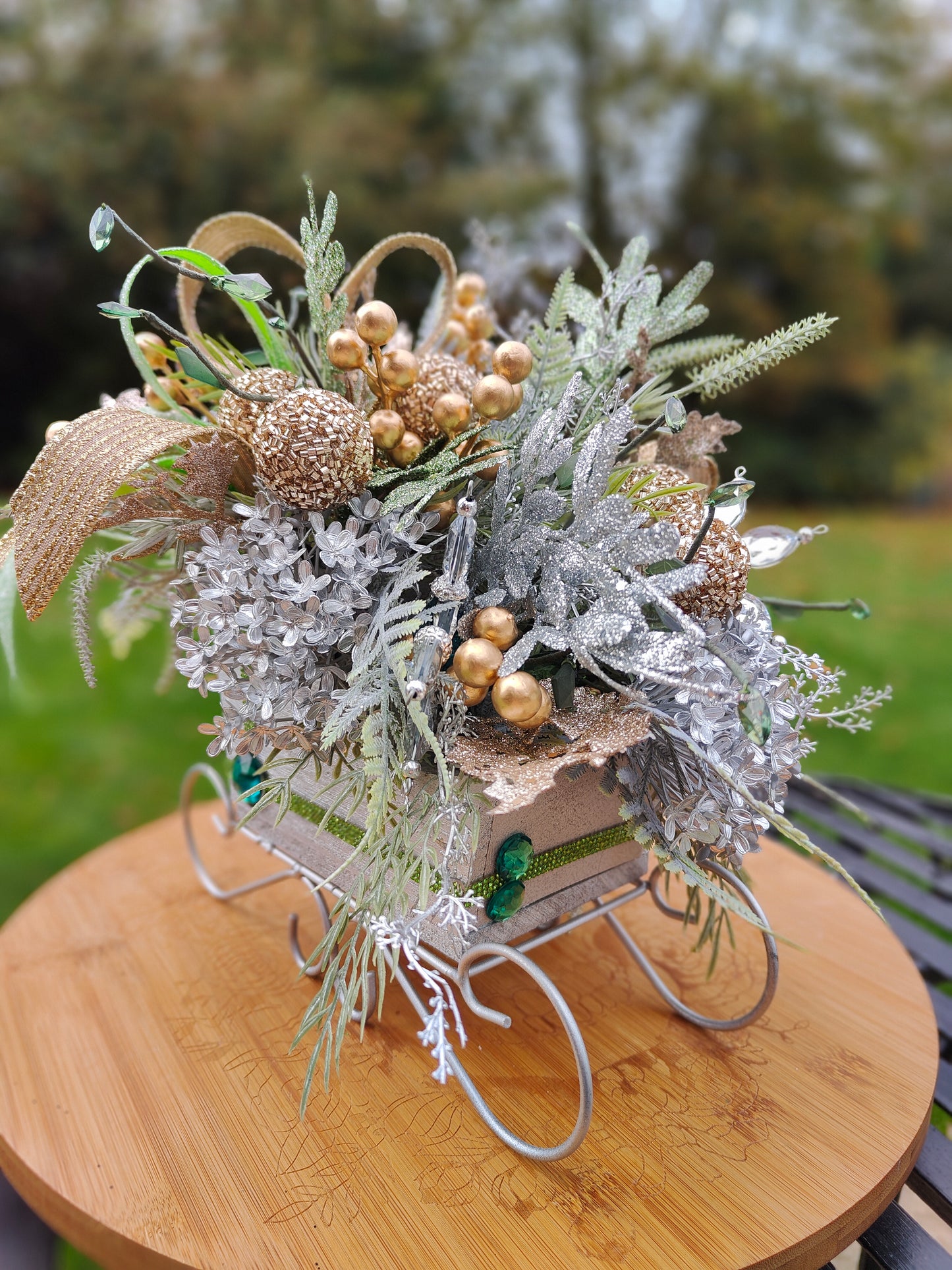 Christmas decoration sleigh gold silver tablecentre arrangement