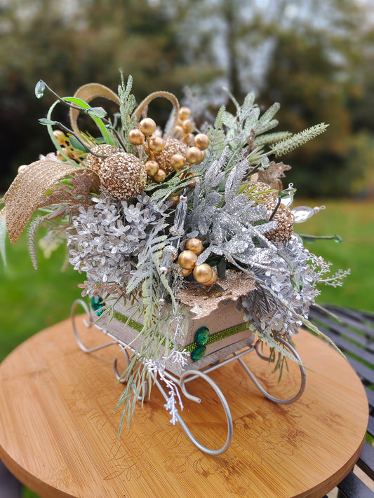 Christmas decoration sleigh gold silver tablecentre arrangement