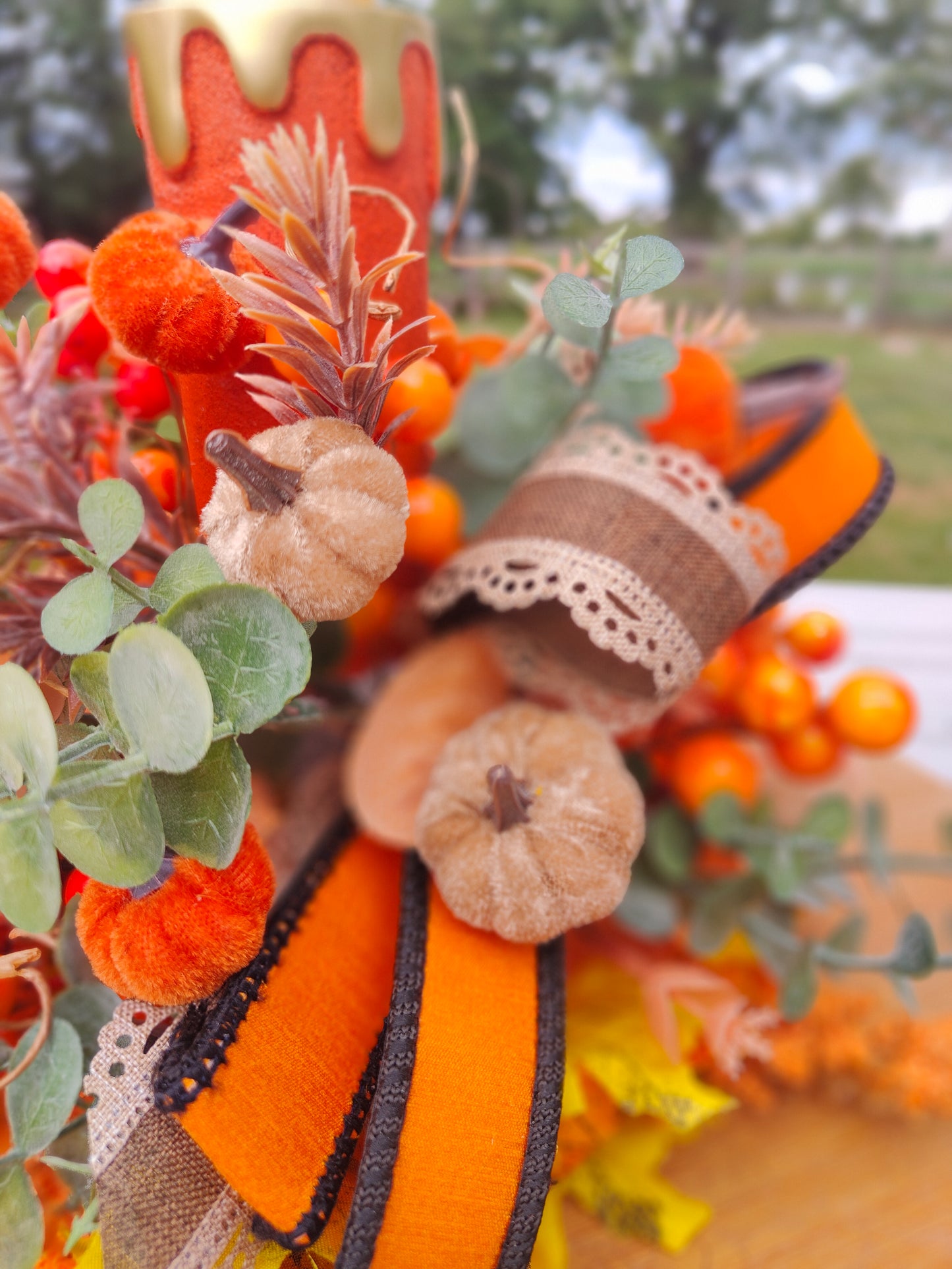 Autumn candle tablecentre arrangement lights up
