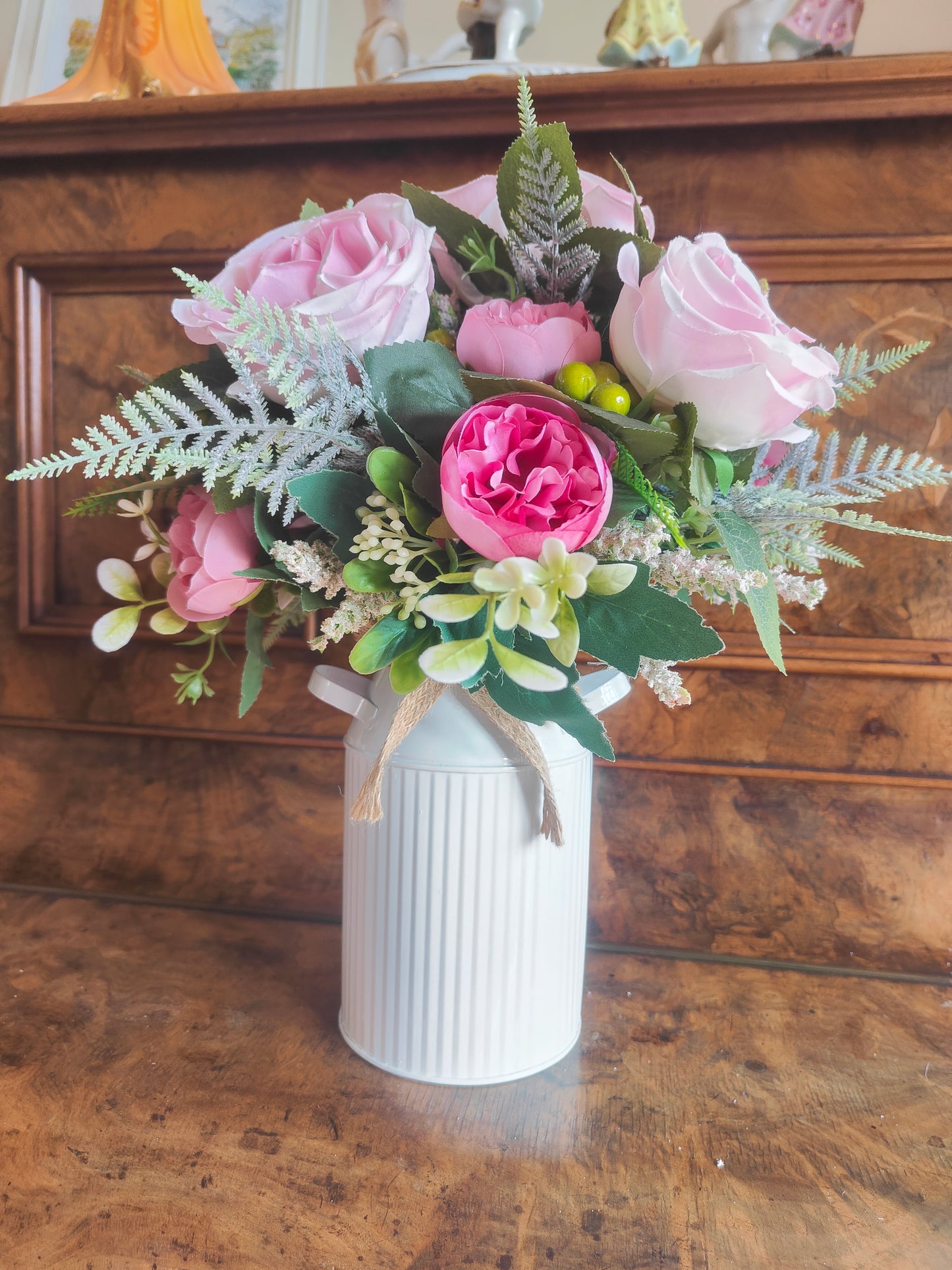 Pink flower arrangement milk churn centrepiece wedding flowers gift