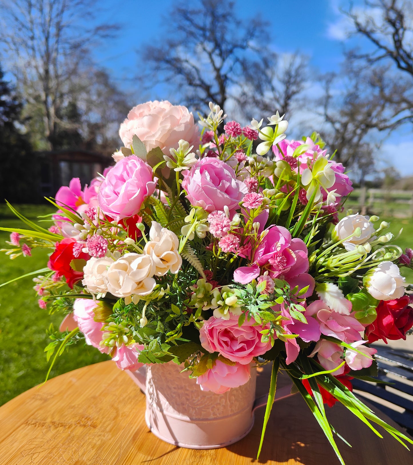 Flower arrangement watering can planter lilac lavender pinks