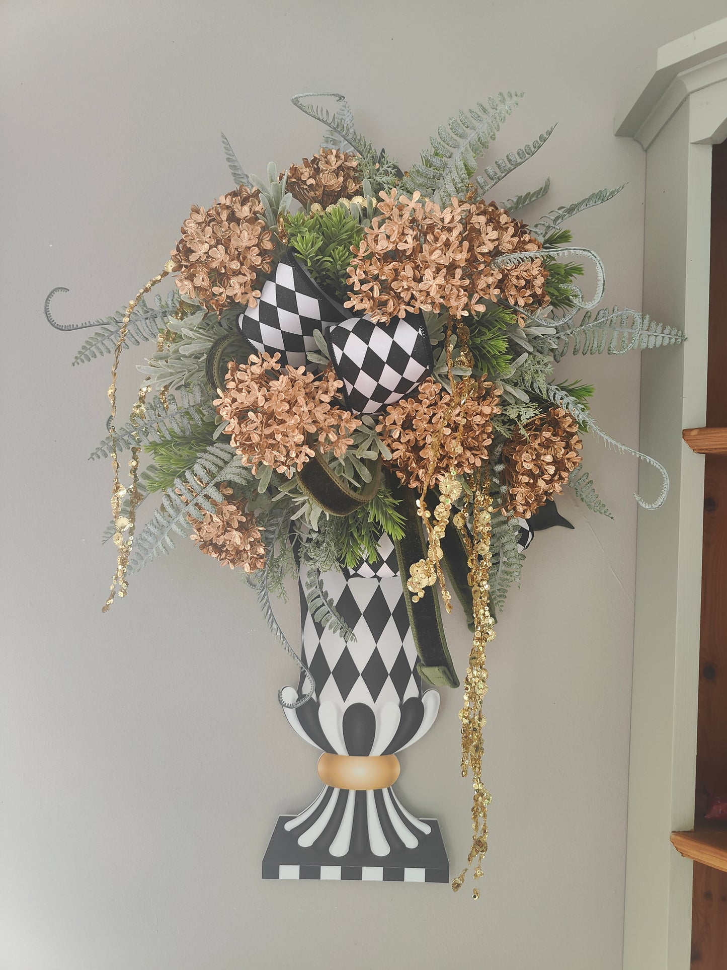 Vase wreath wall decor Mackenzie Childs style vibes Christmas swag