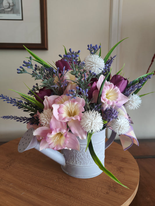 Flower arrangement watering can planter lilac lavender pinks