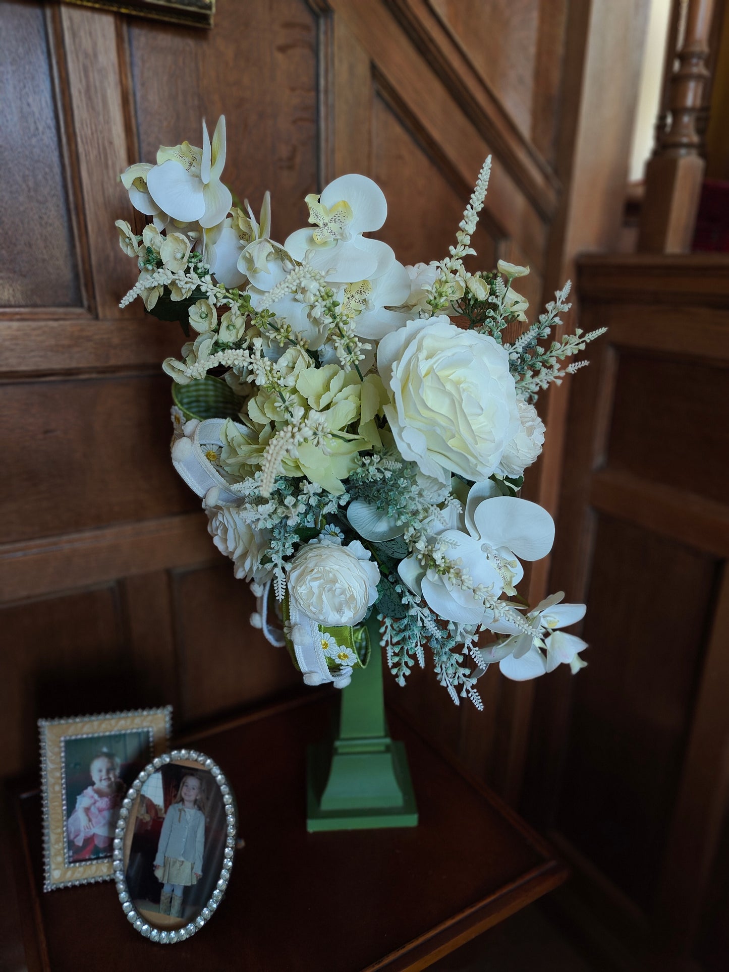 White flower arrangement candlestick tall centrepiece peonies hydrangea orchids ivory artificial flowers