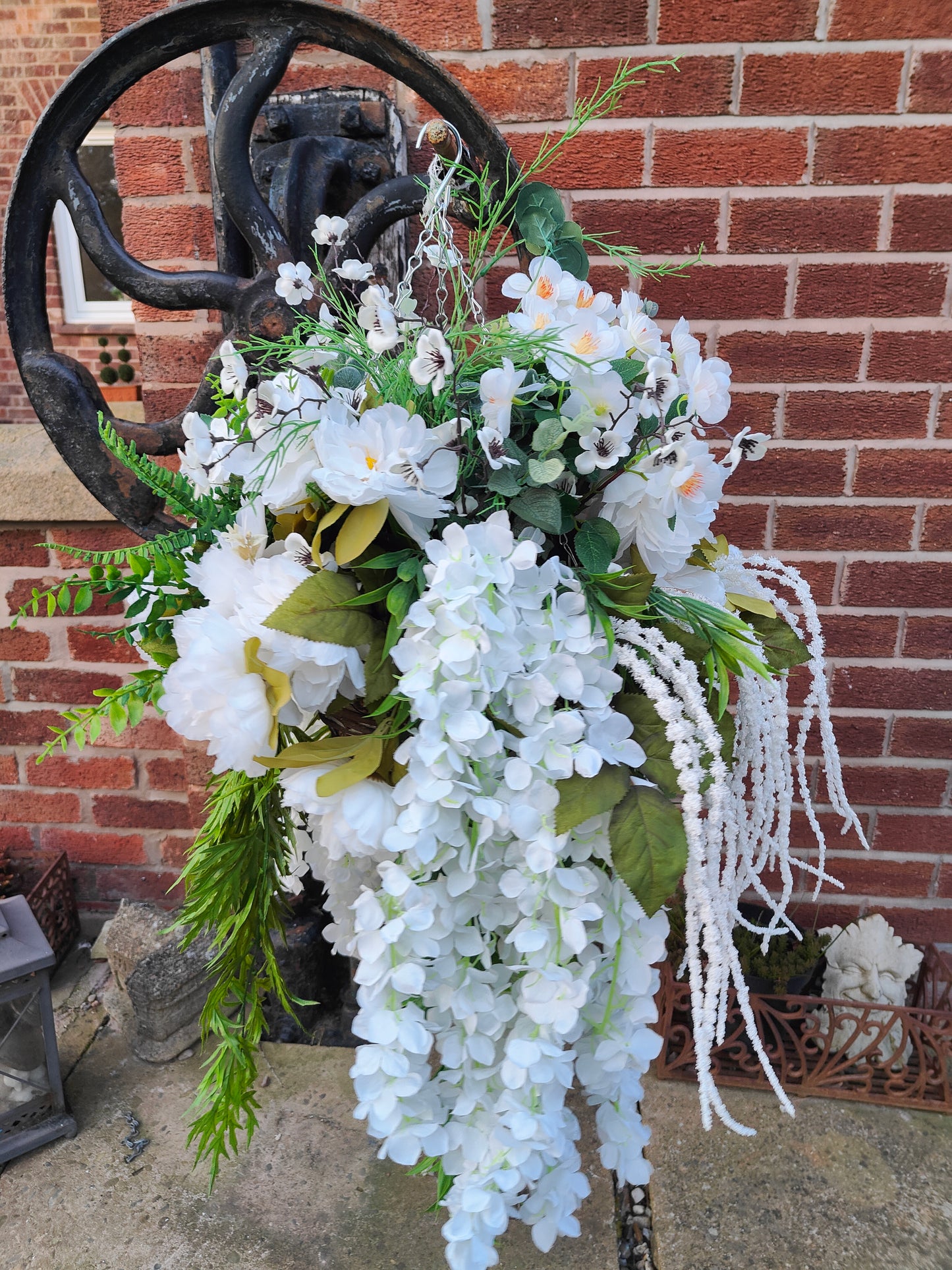 Hanging basket very large white artificial flowers cone