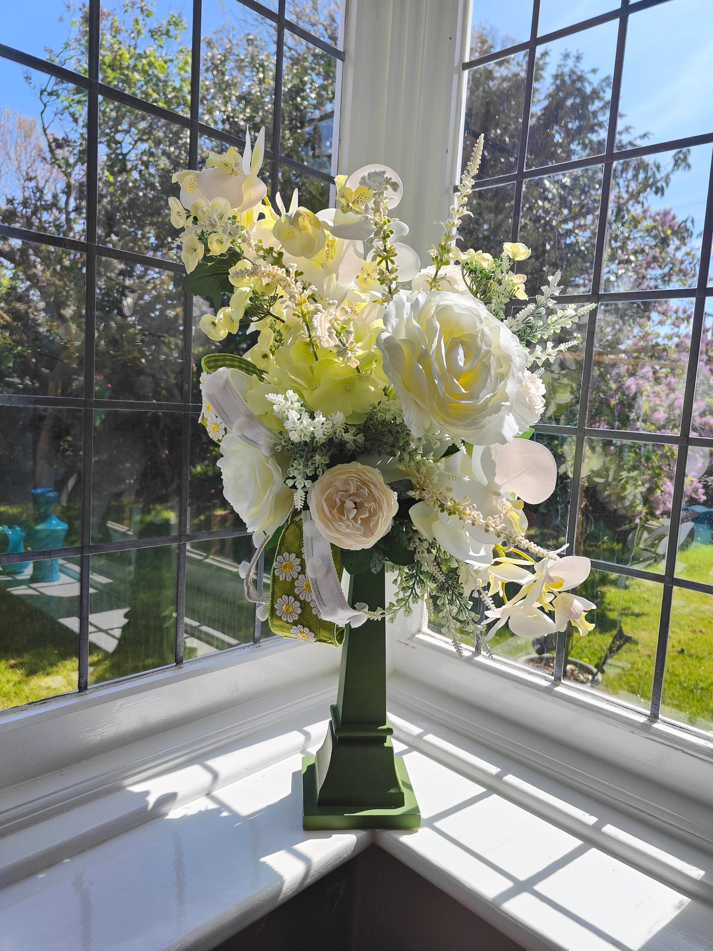 White flower arrangement candlestick tall centrepiece peonies hydrangea orchids ivory artificial flowers