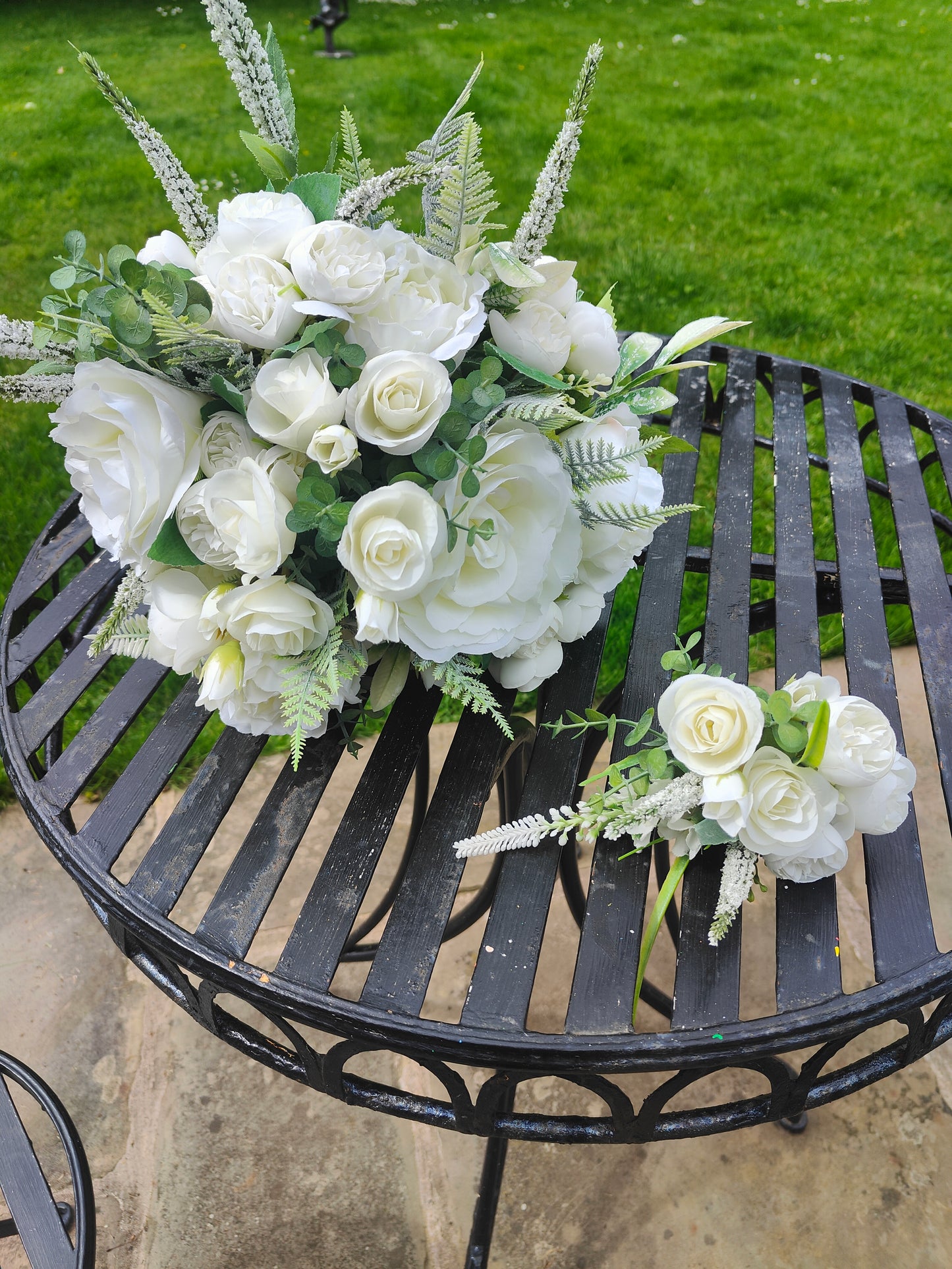 Bride bouquet white roses, peonies, ranunculus and matching groom button hole