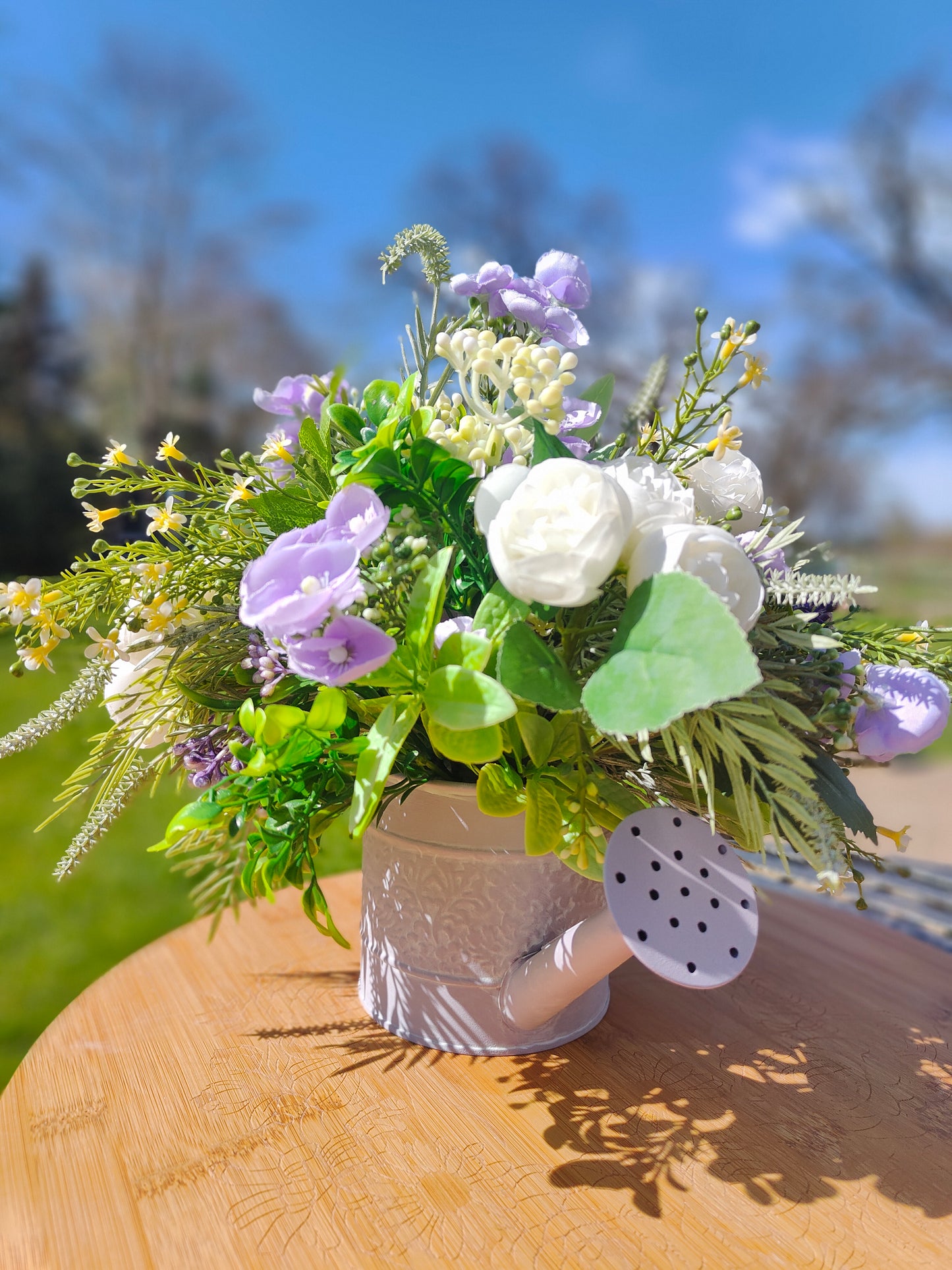 Flower arrangement watering can planter lilac lavender pinks