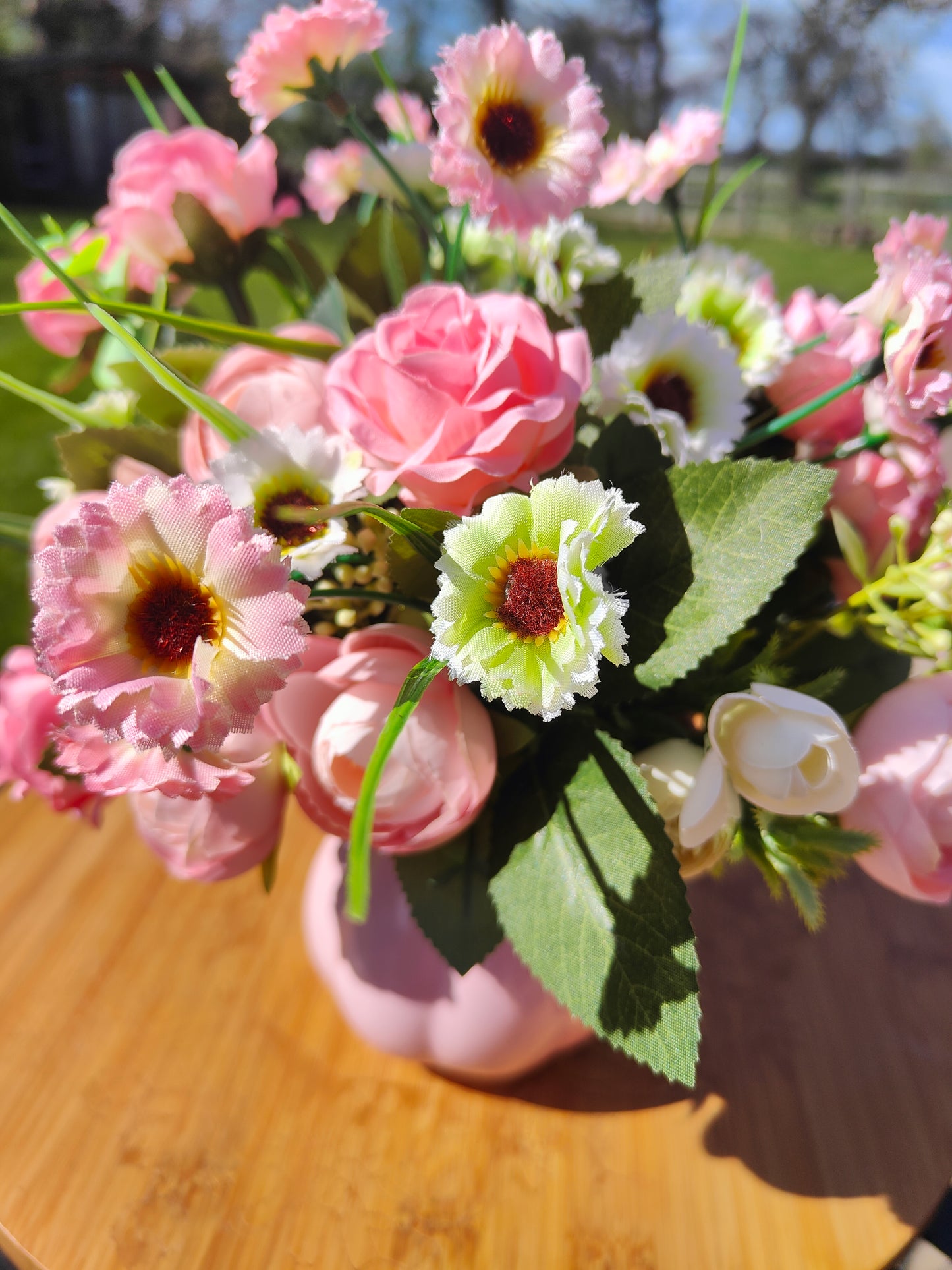 Flower arrangement artificial pink roses ranunculus in ceramic pink jug by Price & Kensington vintage