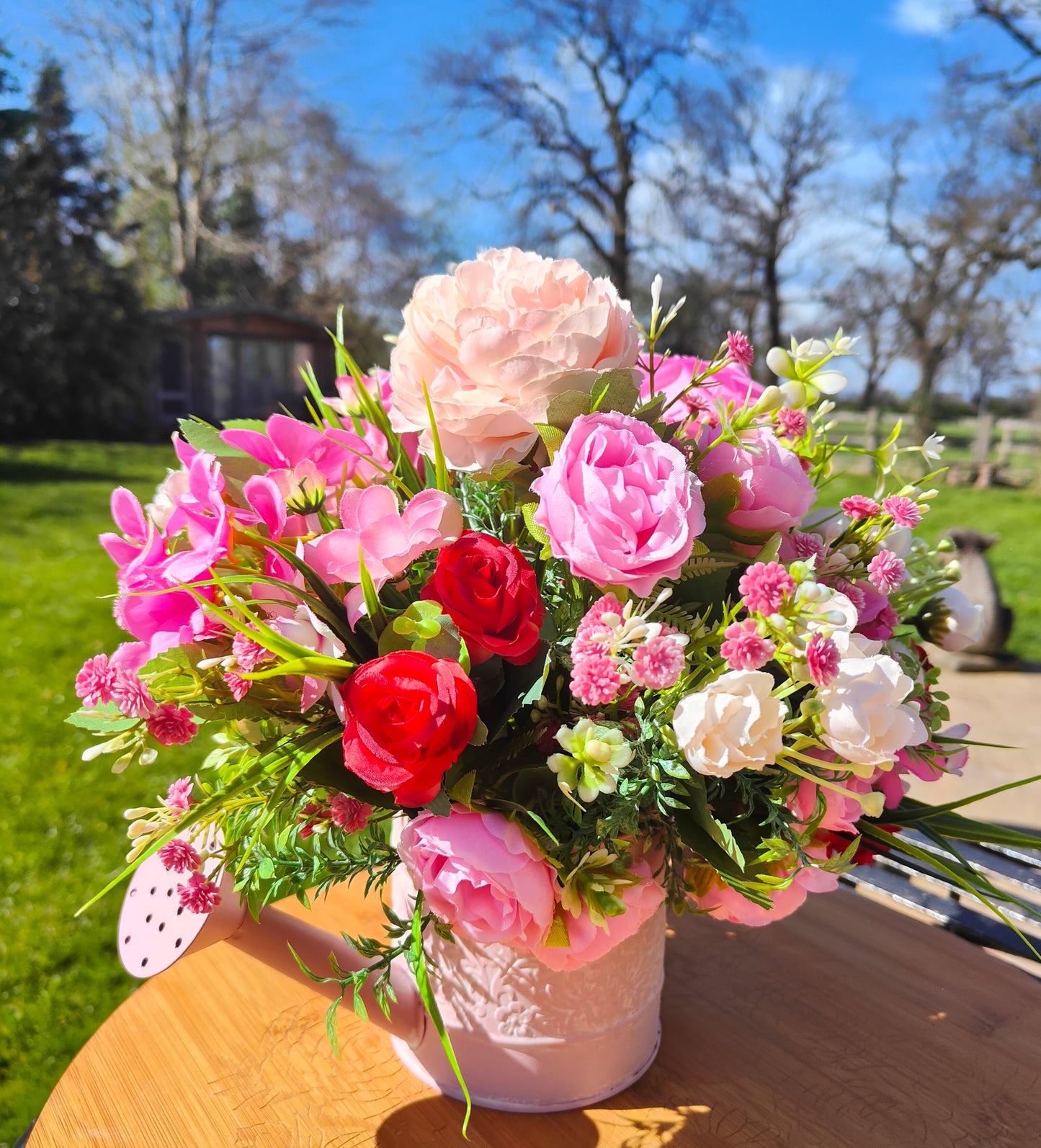 Flower arrangement watering can planter lilac lavender pinks