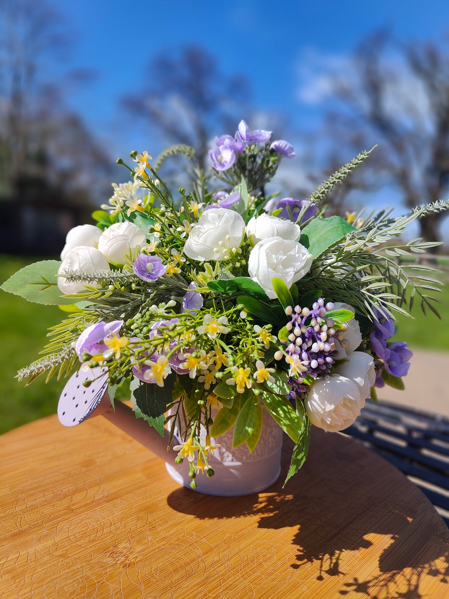 Flower arrangement watering can planter lilac lavender pinks