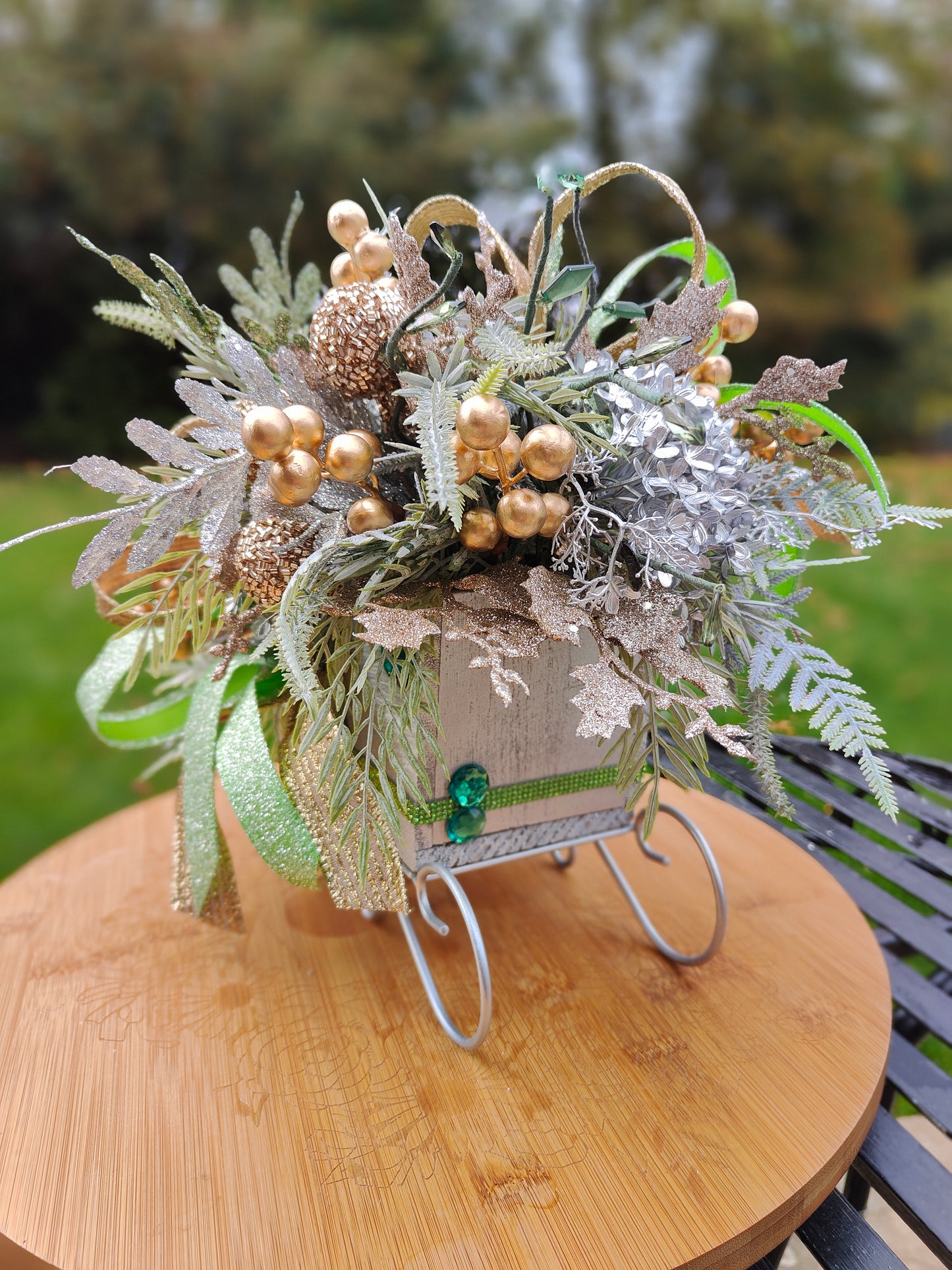Christmas decoration sleigh gold silver tablecentre arrangement