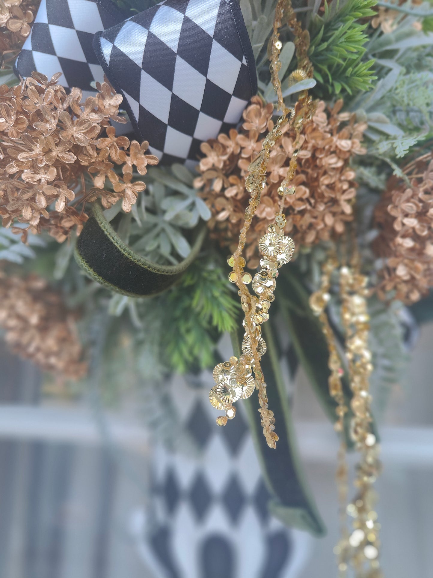 Vase wreath wall decor Mackenzie Childs style vibes Christmas swag