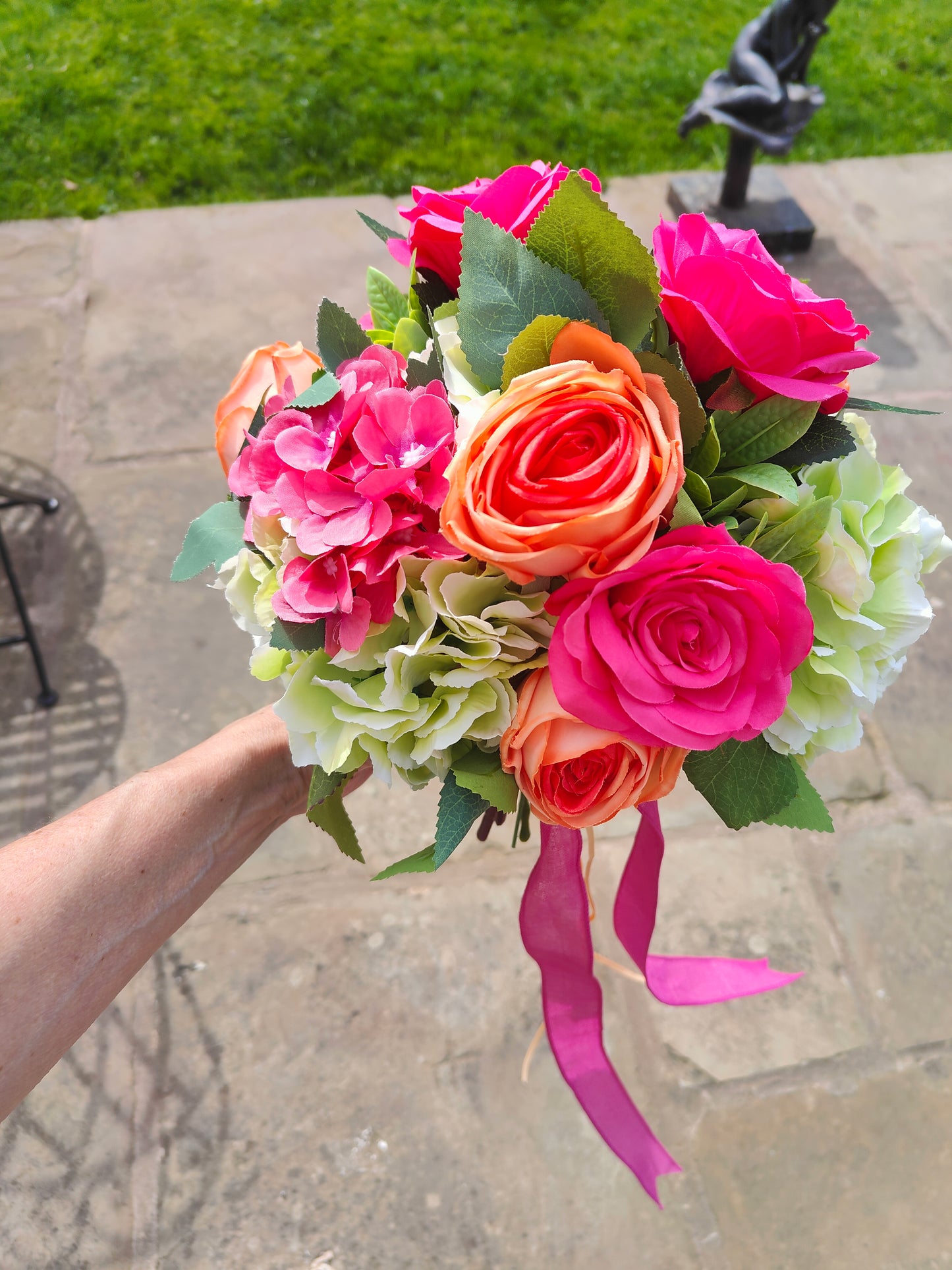 Wedding bride bouquet hand-tied artificial flowers dark pink cerise, orange, pale light green
