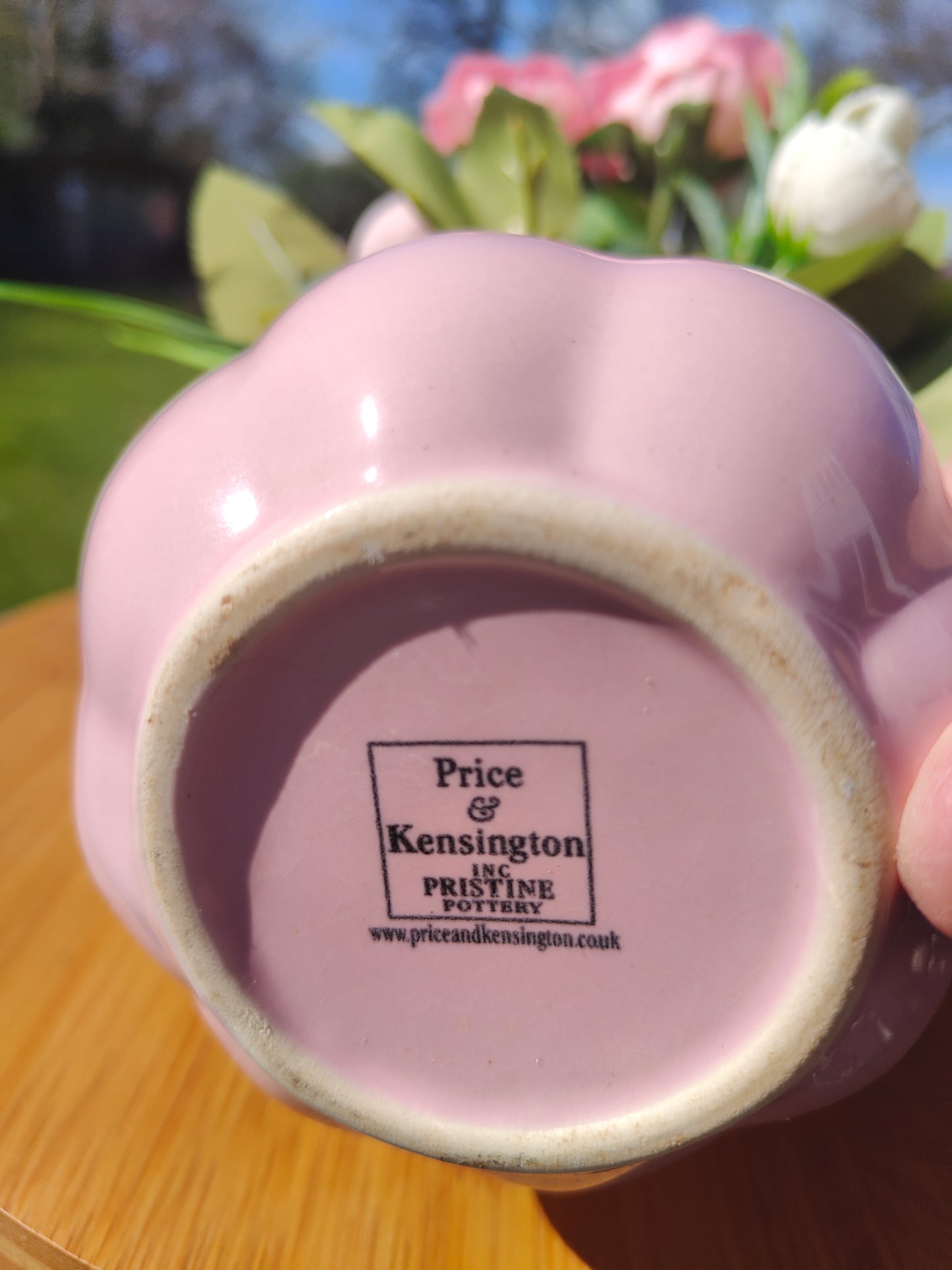 Flower arrangement artificial pink roses ranunculus in ceramic pink jug by Price & Kensington vintage