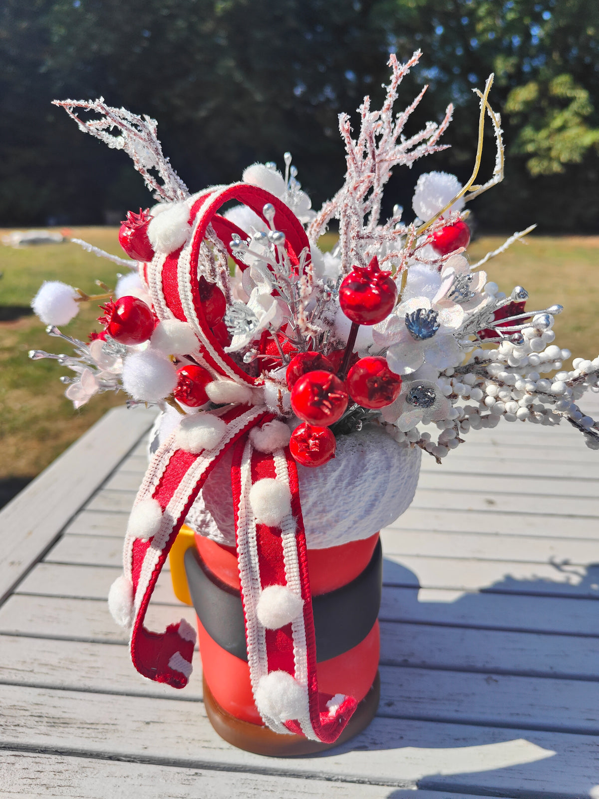 Santa boot centrepiece arrangement Christmas decoration red and white