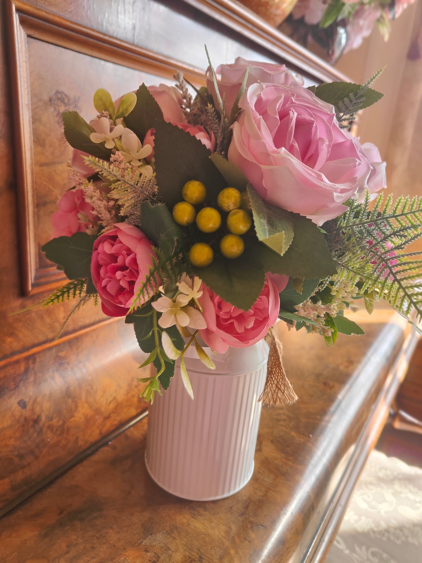 Pink flower arrangement milk churn centrepiece wedding flowers gift