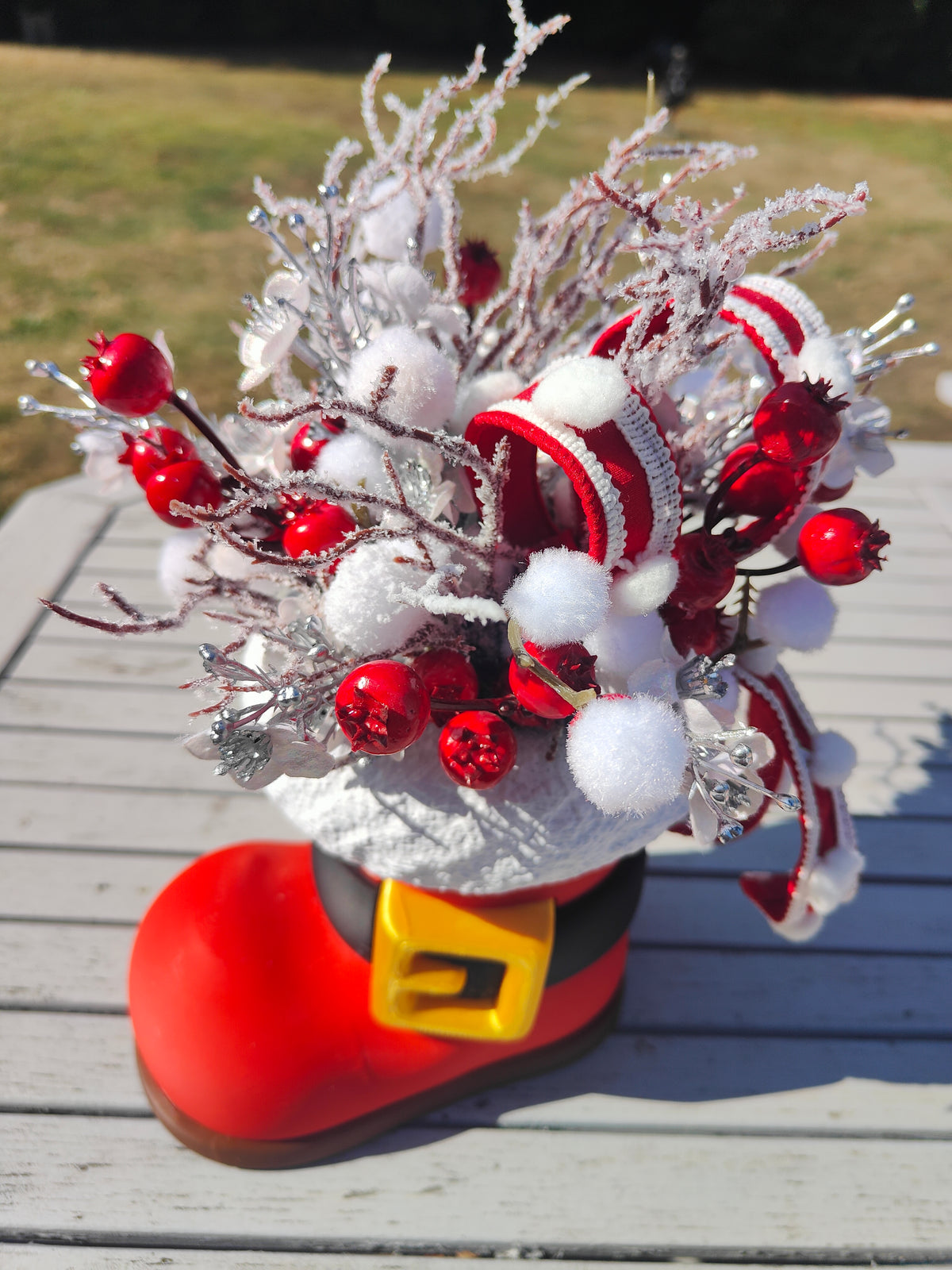 Santa boot centrepiece arrangement Christmas decoration red and white