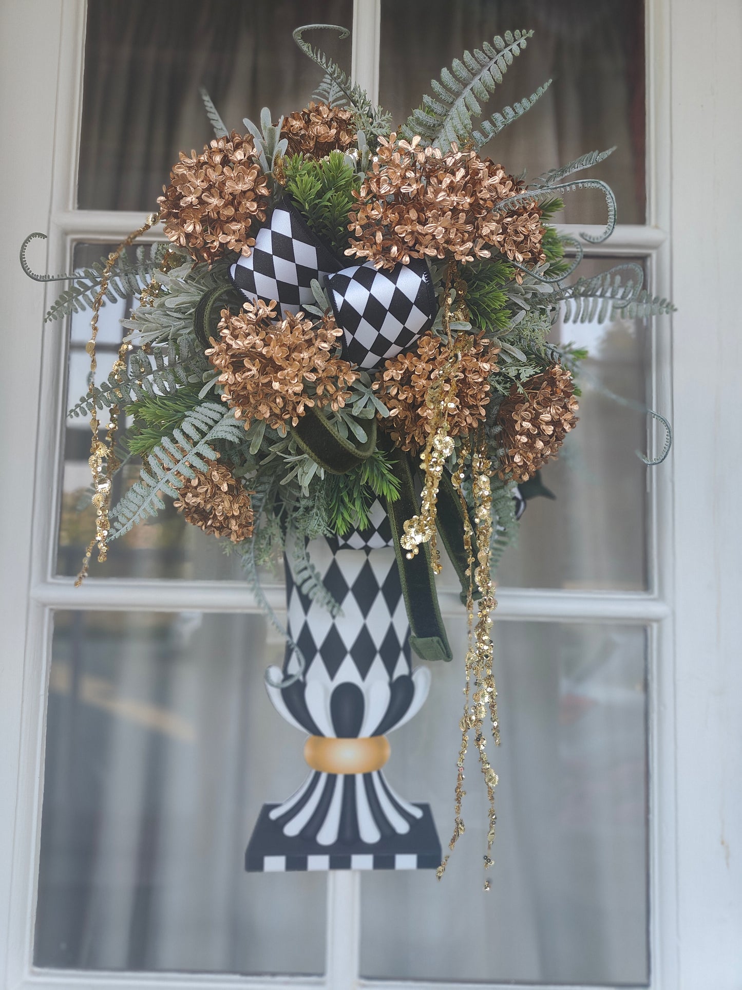 Vase wreath wall decor Mackenzie Childs style vibes Christmas swag