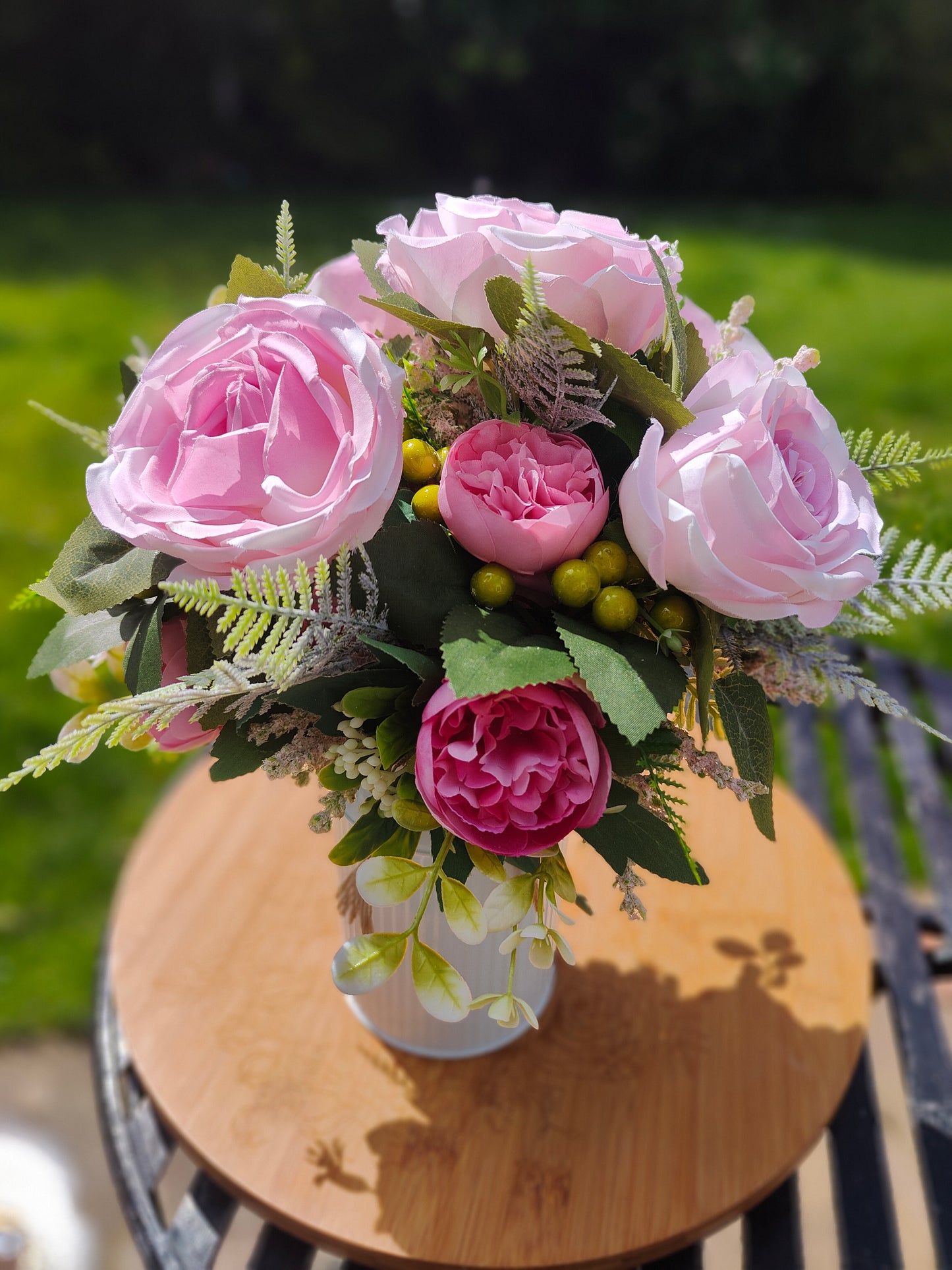 Pink flower arrangement milk churn centrepiece wedding flowers gift