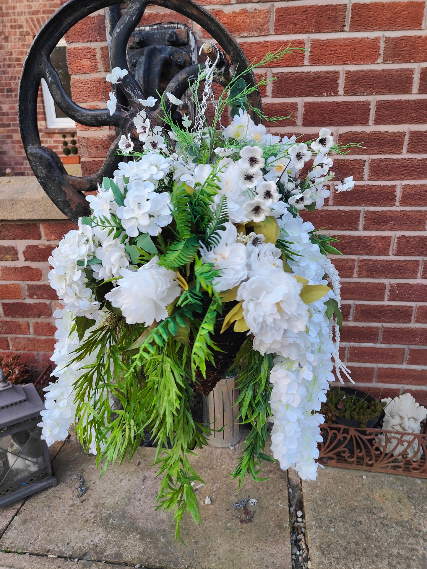 Hanging basket very large white artificial flowers cone