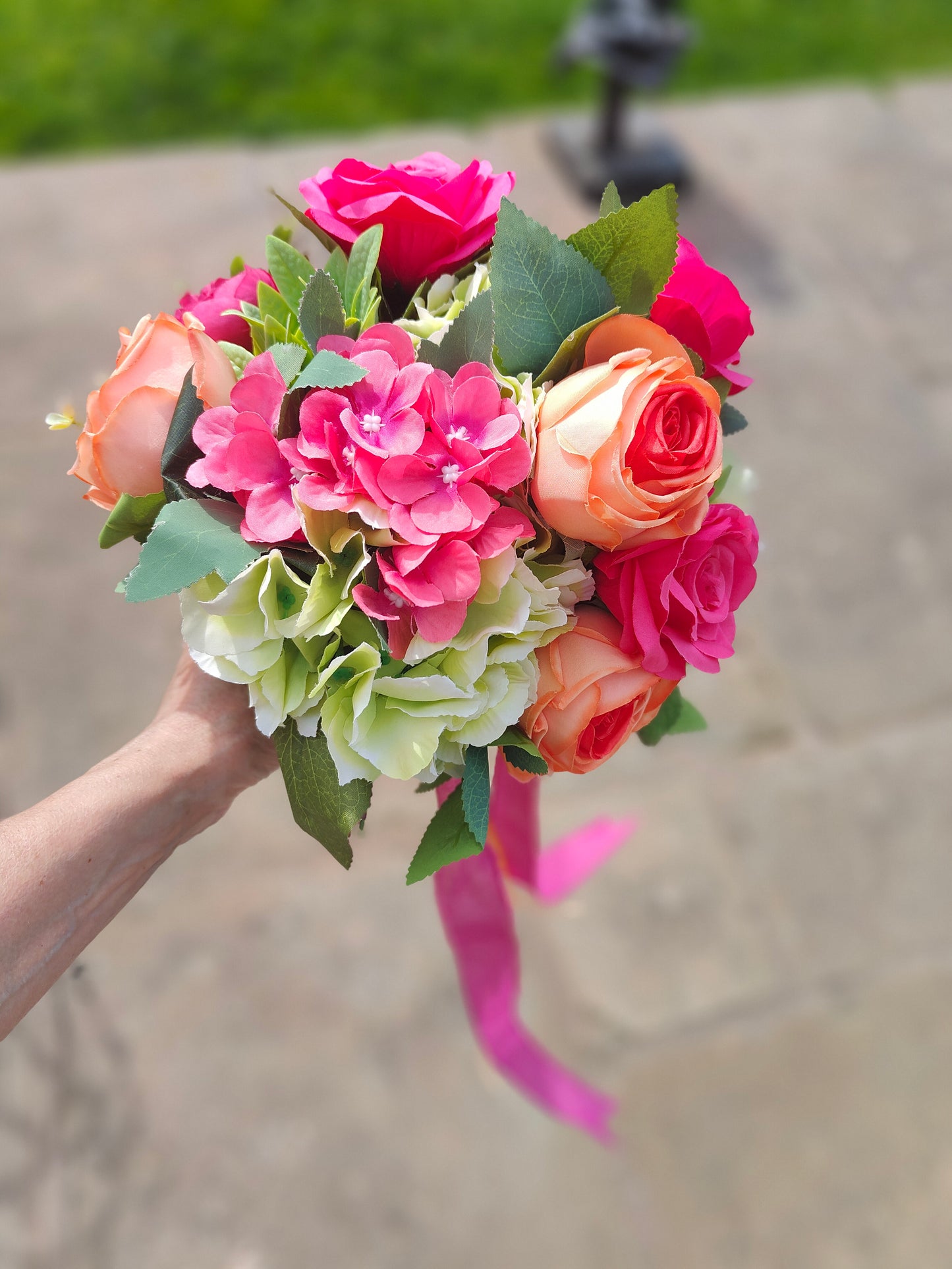 Wedding bride bouquet hand-tied artificial flowers dark pink cerise, orange, pale light green